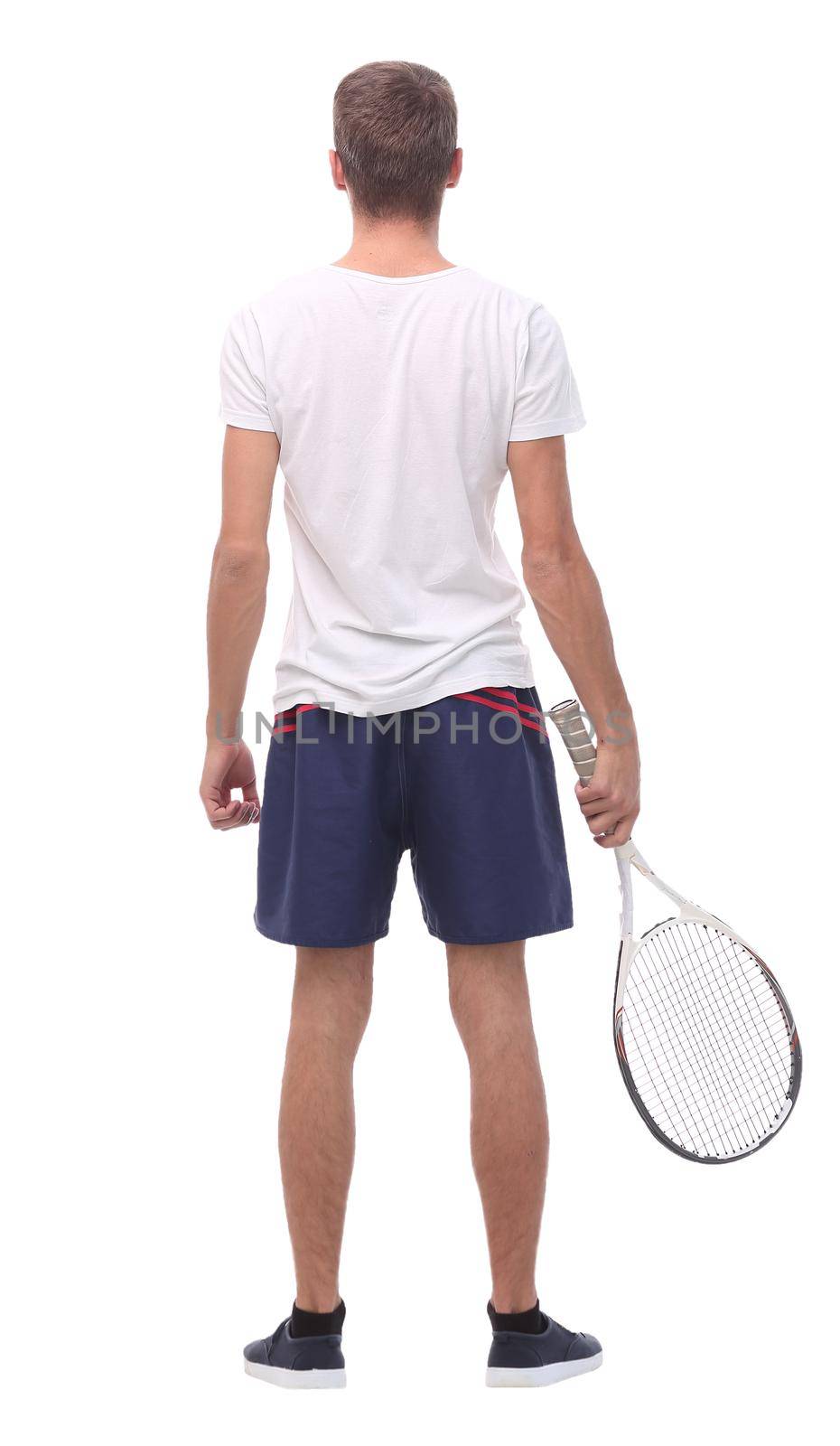 rear view. a young man with a tennis racket. isolated on white background