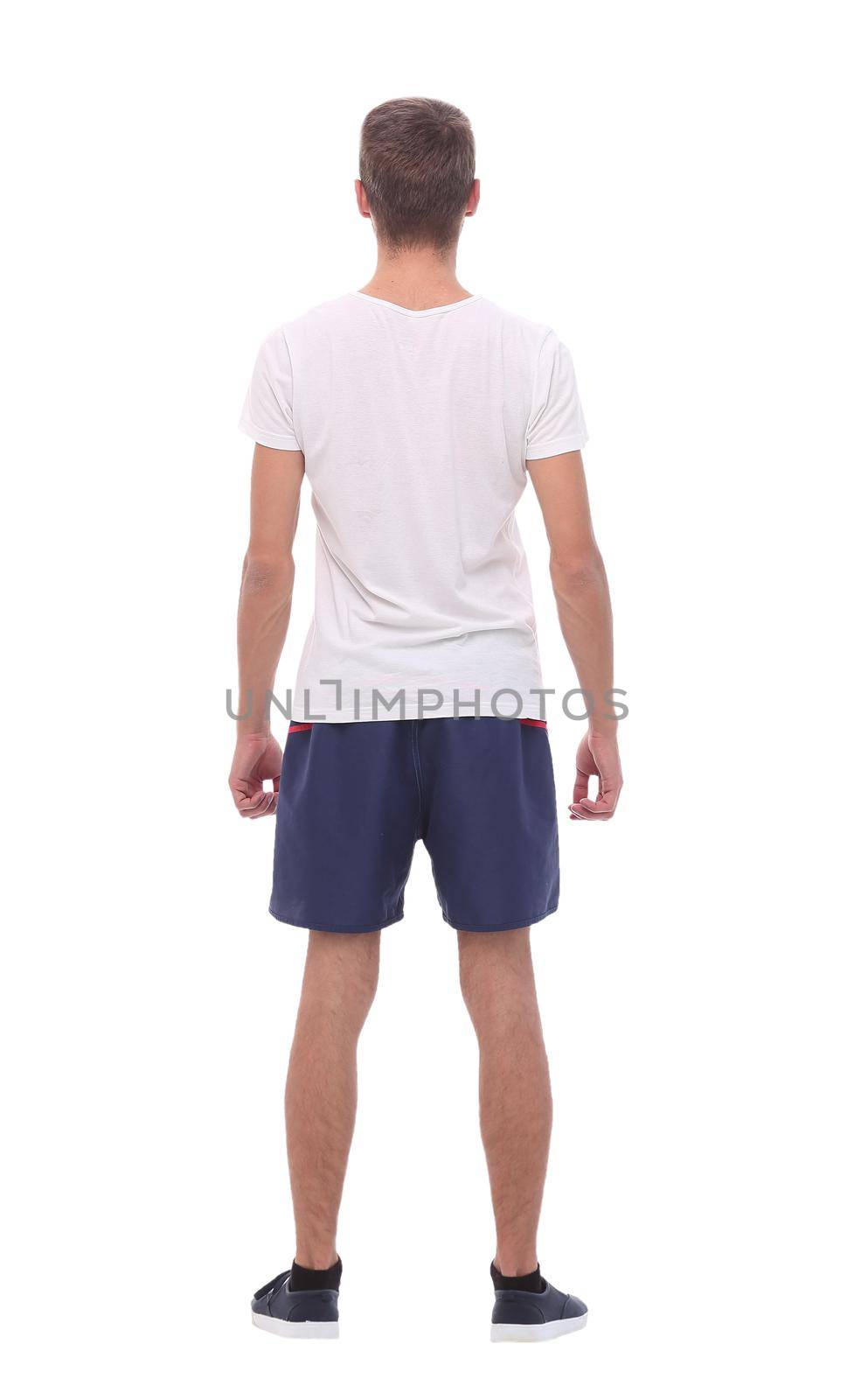 rear view .modern young man in sportswear.isolated on white background