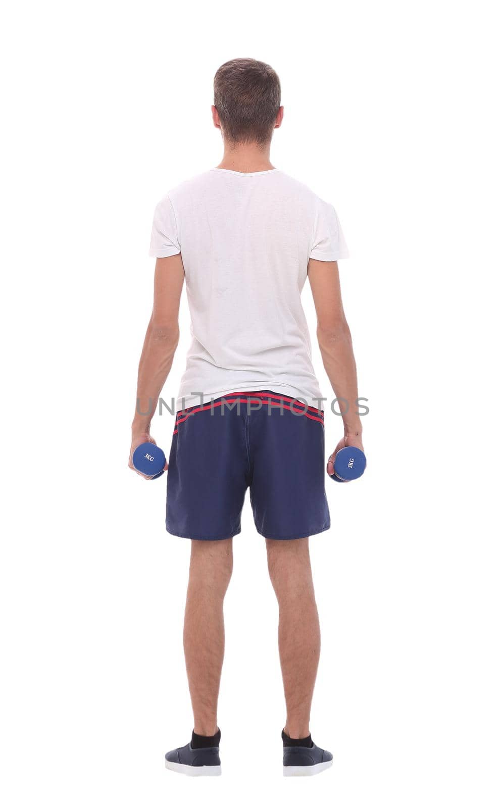 rear view.young man with dumbbells.isolated on white background
