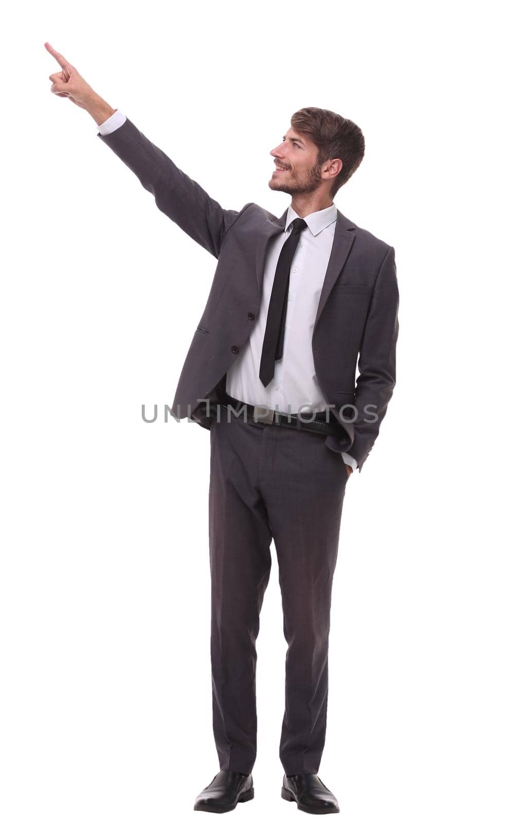 full growth. smiling businessman pointing to copy space.isolated on white background