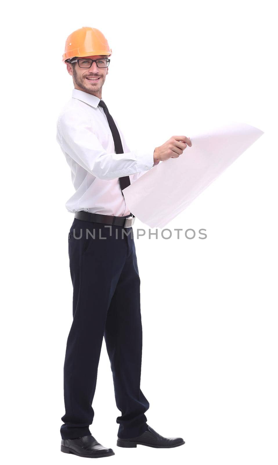 in full growth. architect looking at the drawings of the new project. isolated on white background