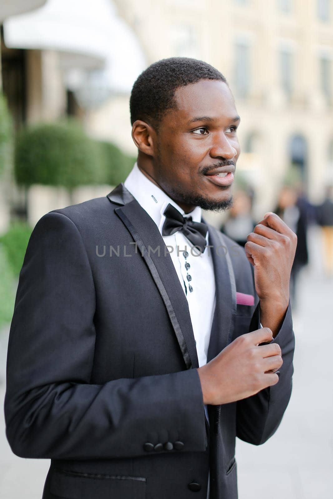 Afro american handsome man wearing suit and smiling. by sisterspro