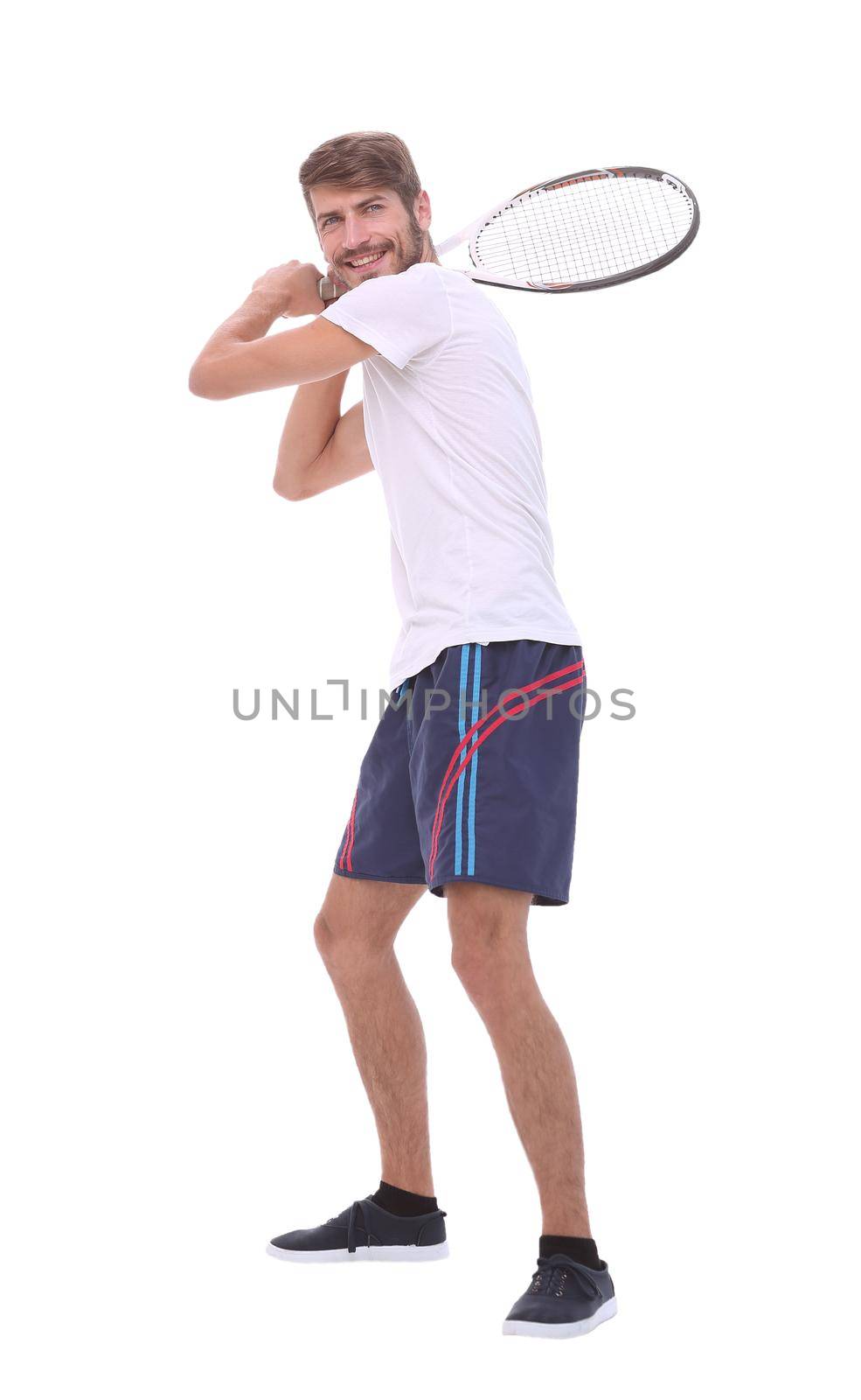 rear view. a young man with a tennis racket. isolated on white background