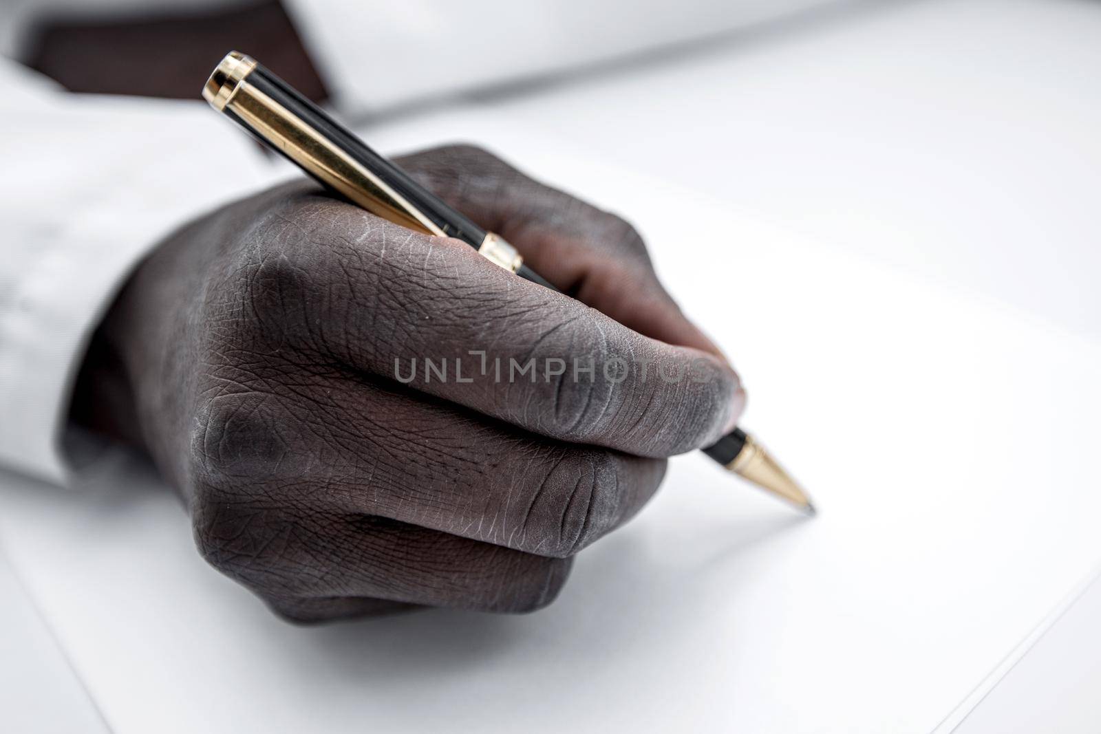 close up. scientist writing data into a lab notebook .photo with copy space