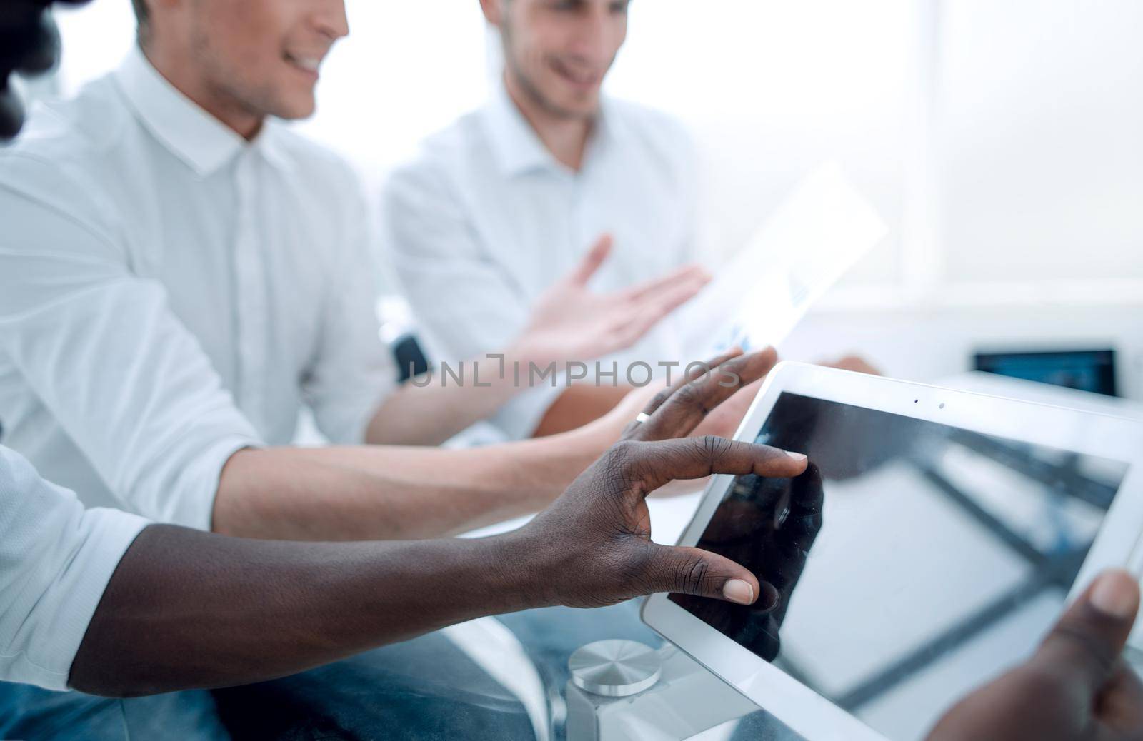 businessman working on a digital tablet by asdf