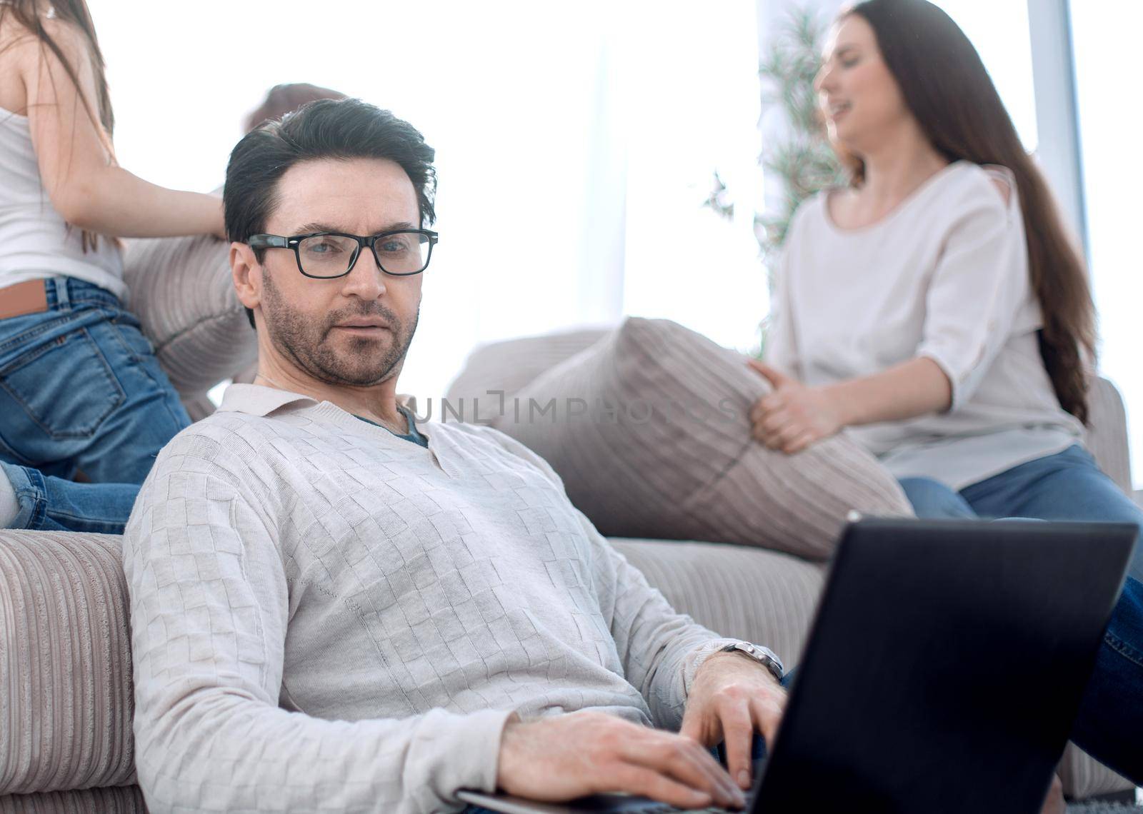 modern man work on a laptop at his home.people and technology