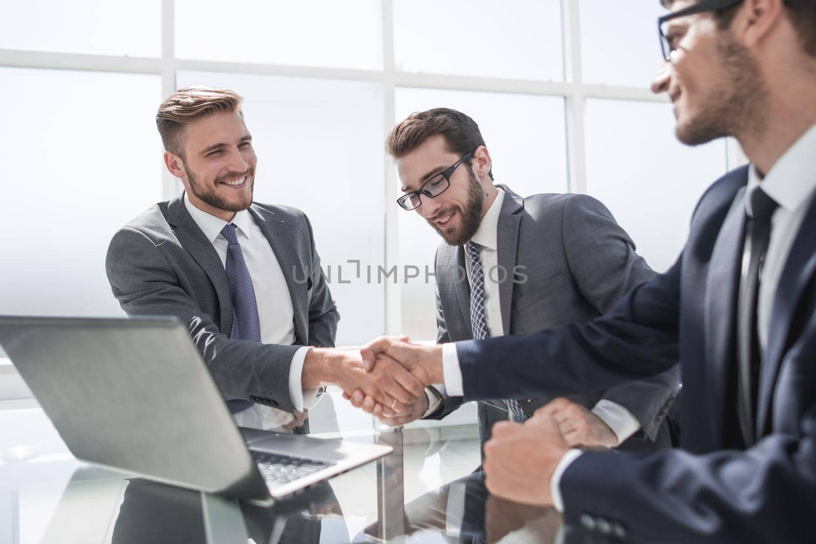 handshake employees at the Desk by asdf