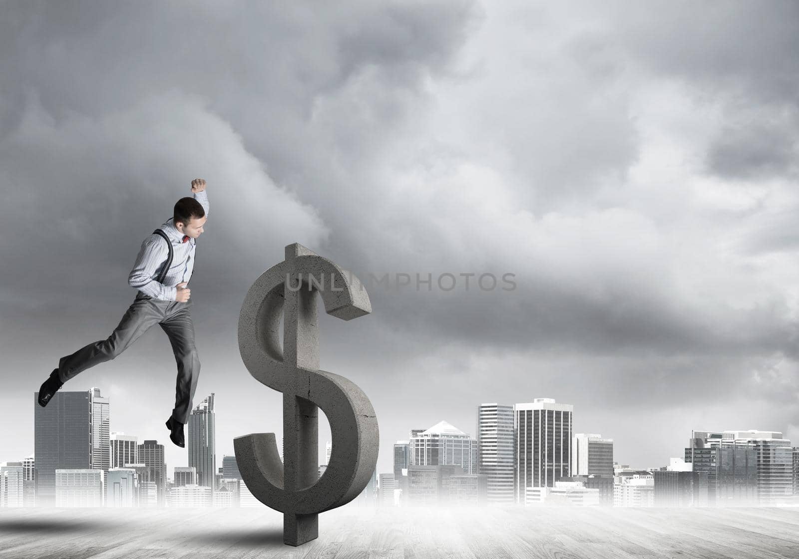 Young furious businessman going to crash with fist stone dollar symbol
