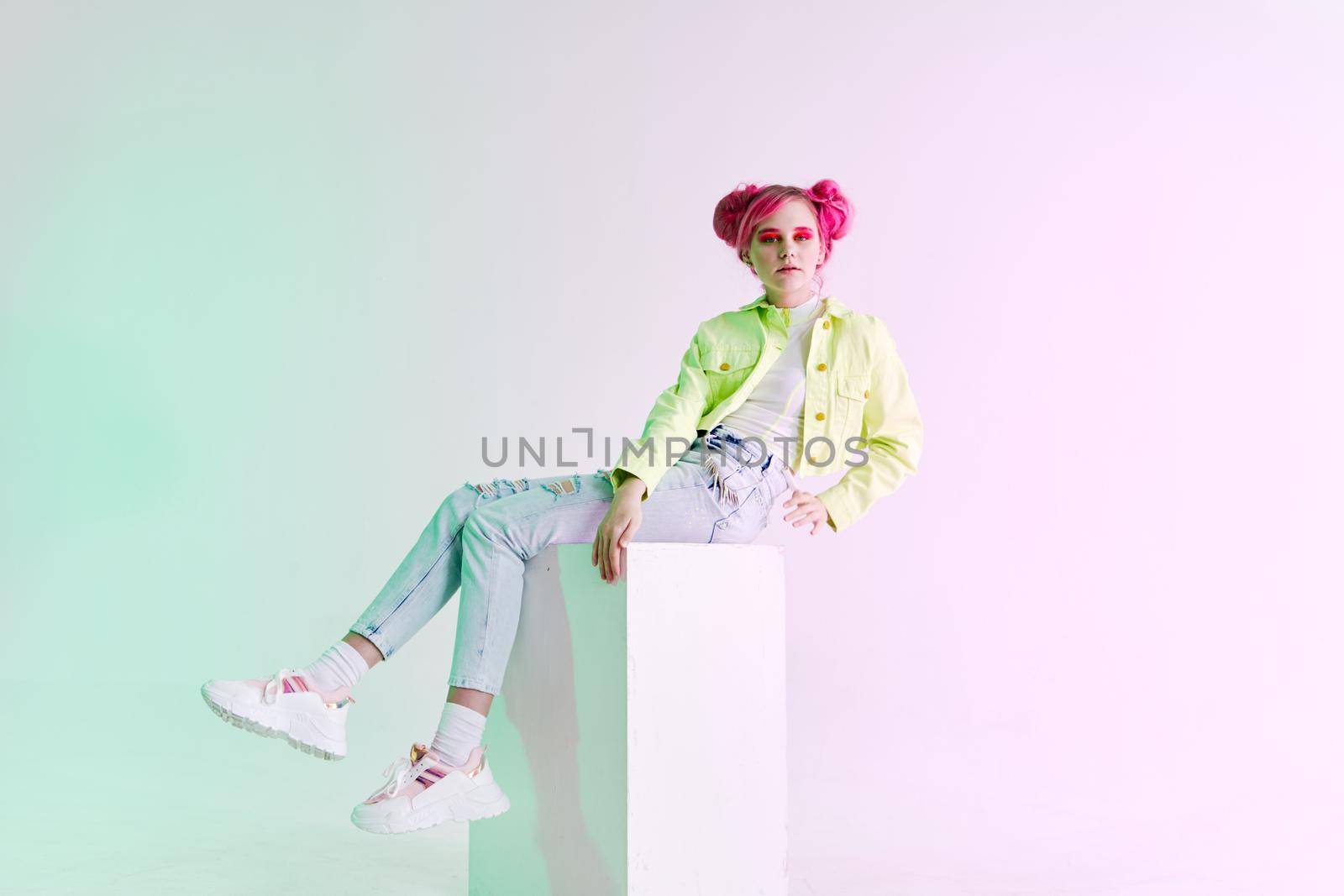 fashionable woman pink hair posing fashion clothes Acid style design. High quality photo