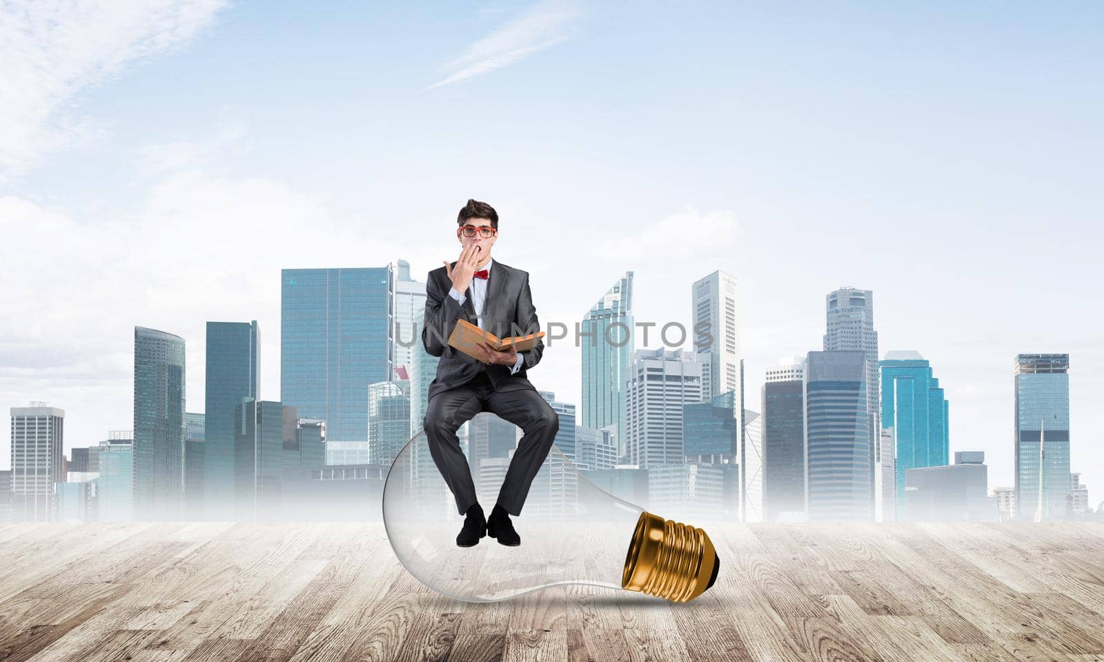 young businessman with a book. Concept of Creativity in Business
