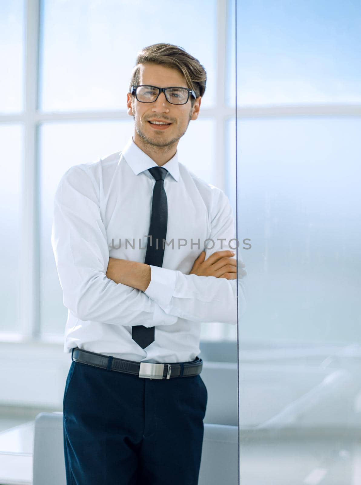 close up.young employee standing in the office.business people