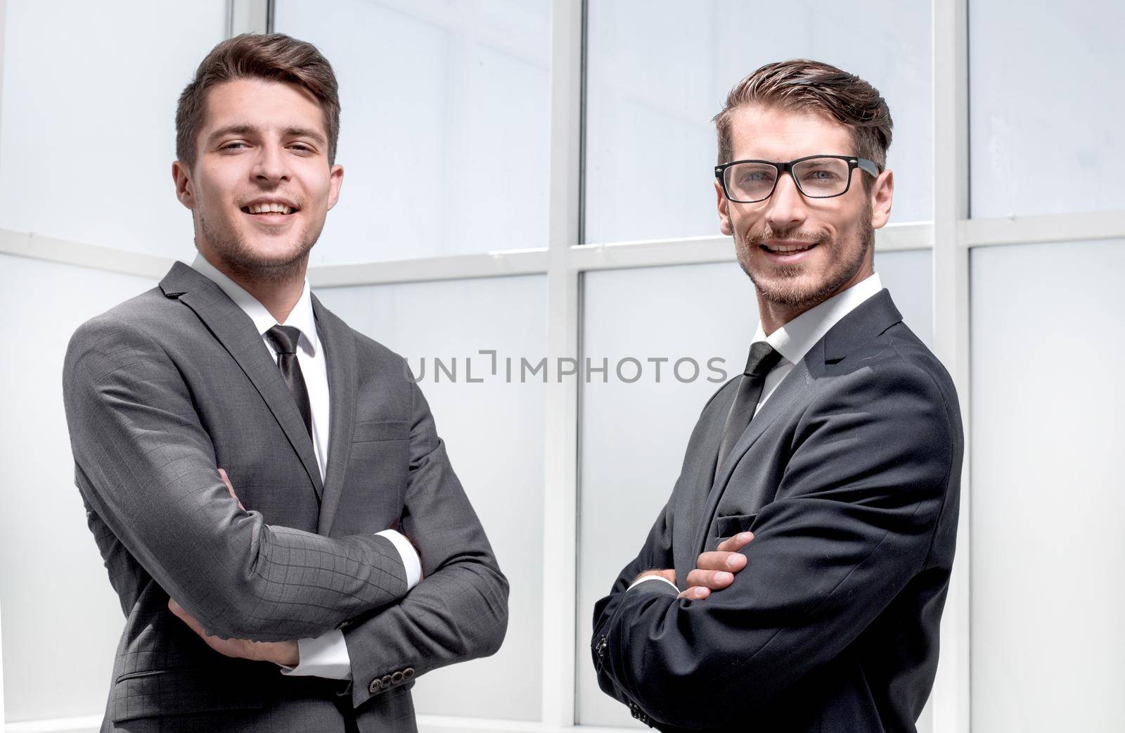 two young business men isolated on office