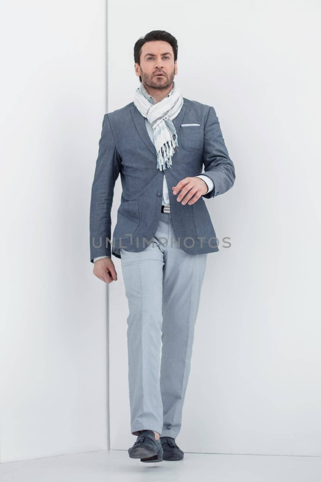 full height.confident business man.isolated on light background