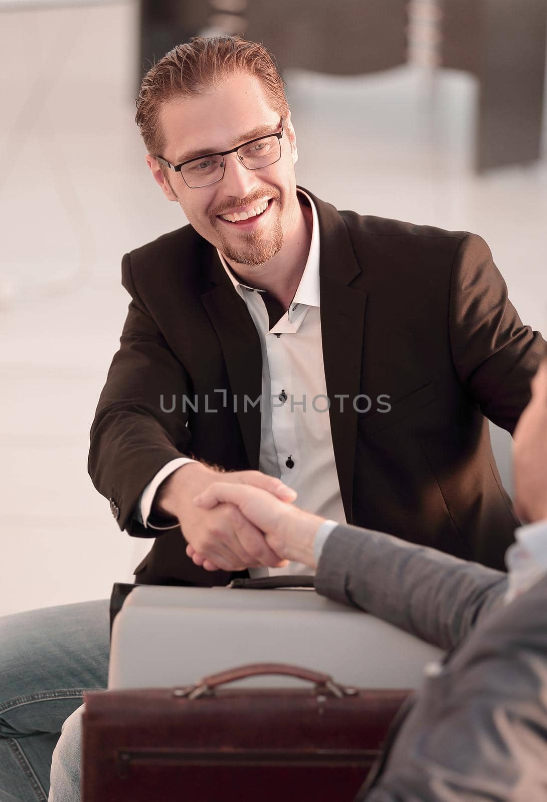 close up. handshake of business people on blurred background