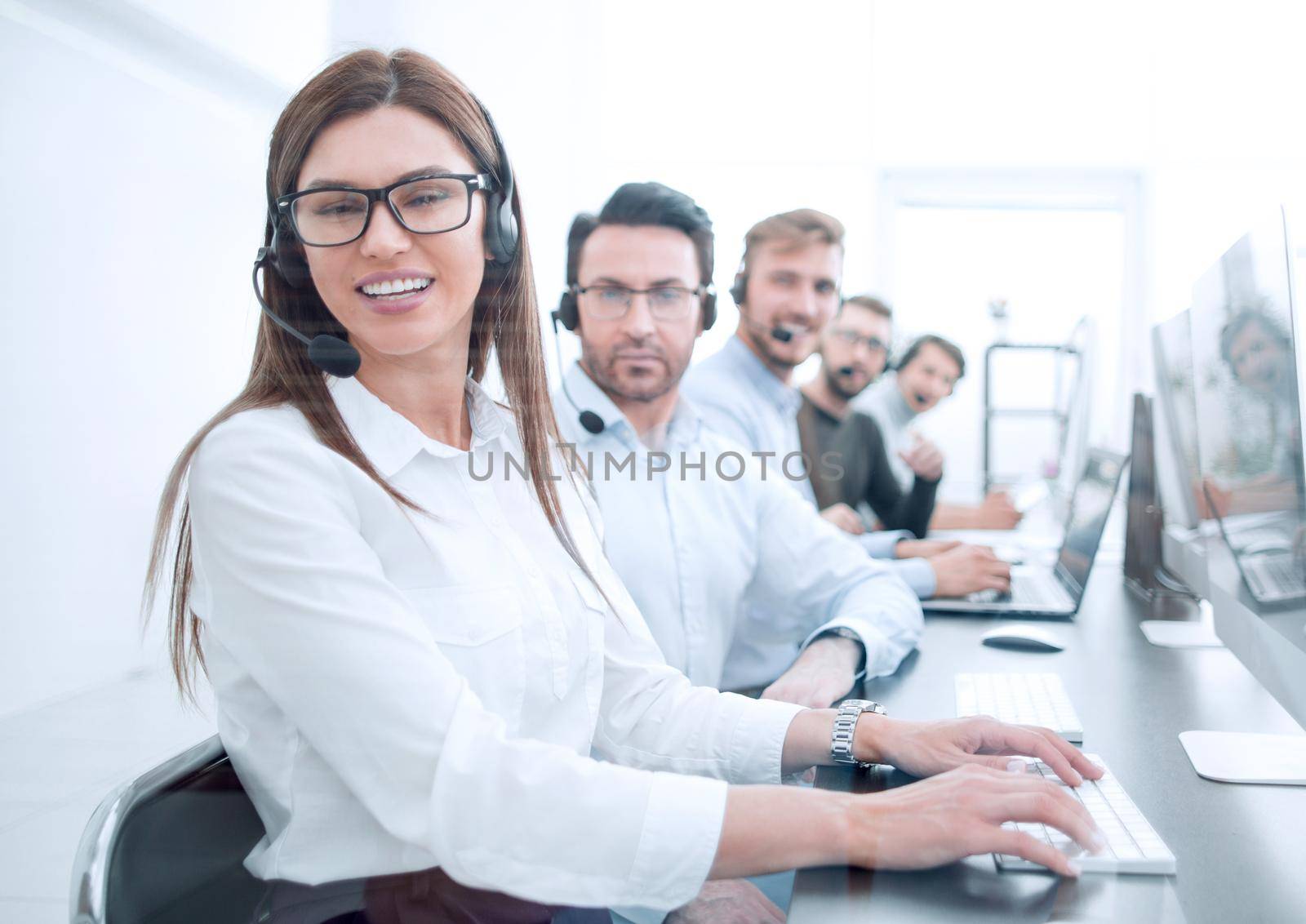 woman operator in the workplace at the call center.photo with copy space
