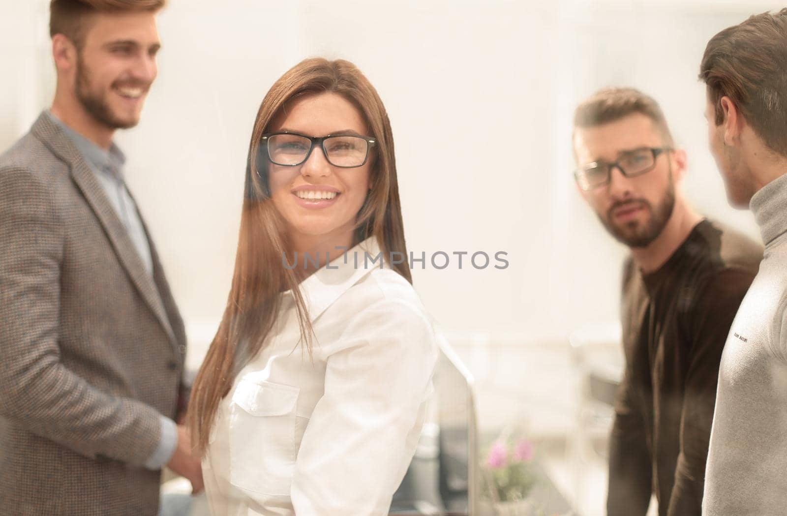 close up.employees standing in the office.business concept