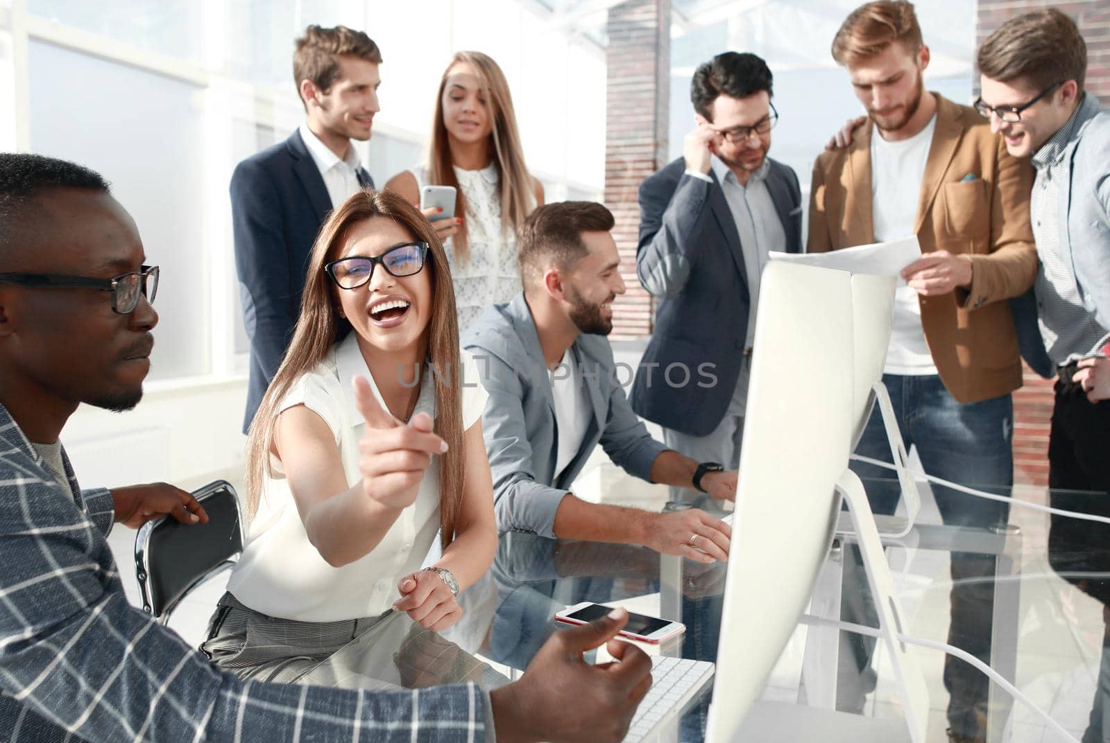 business team is preparing a new presentation.the concept of teamwork