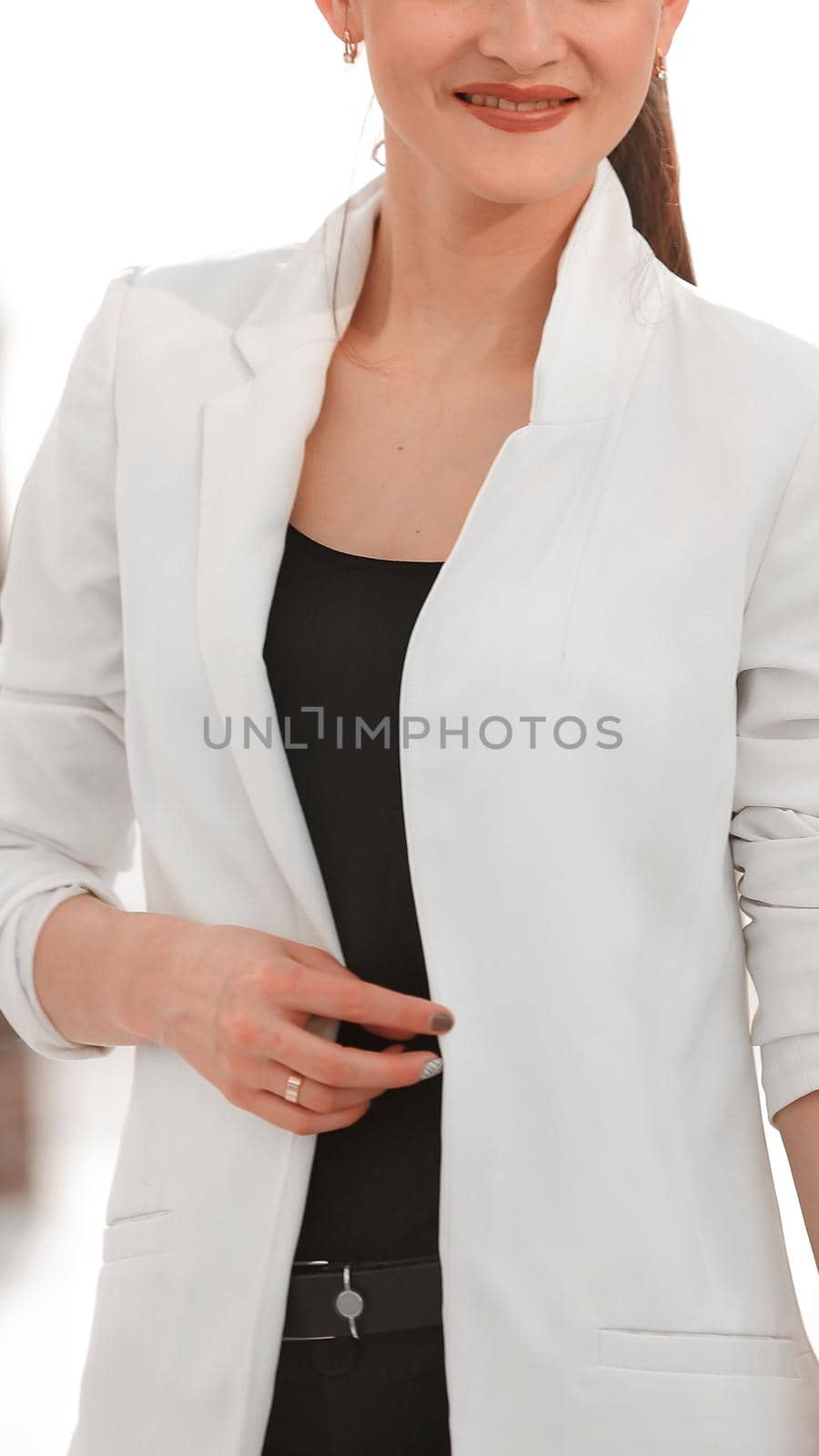 portrait of successful young business woman isolated on white background.