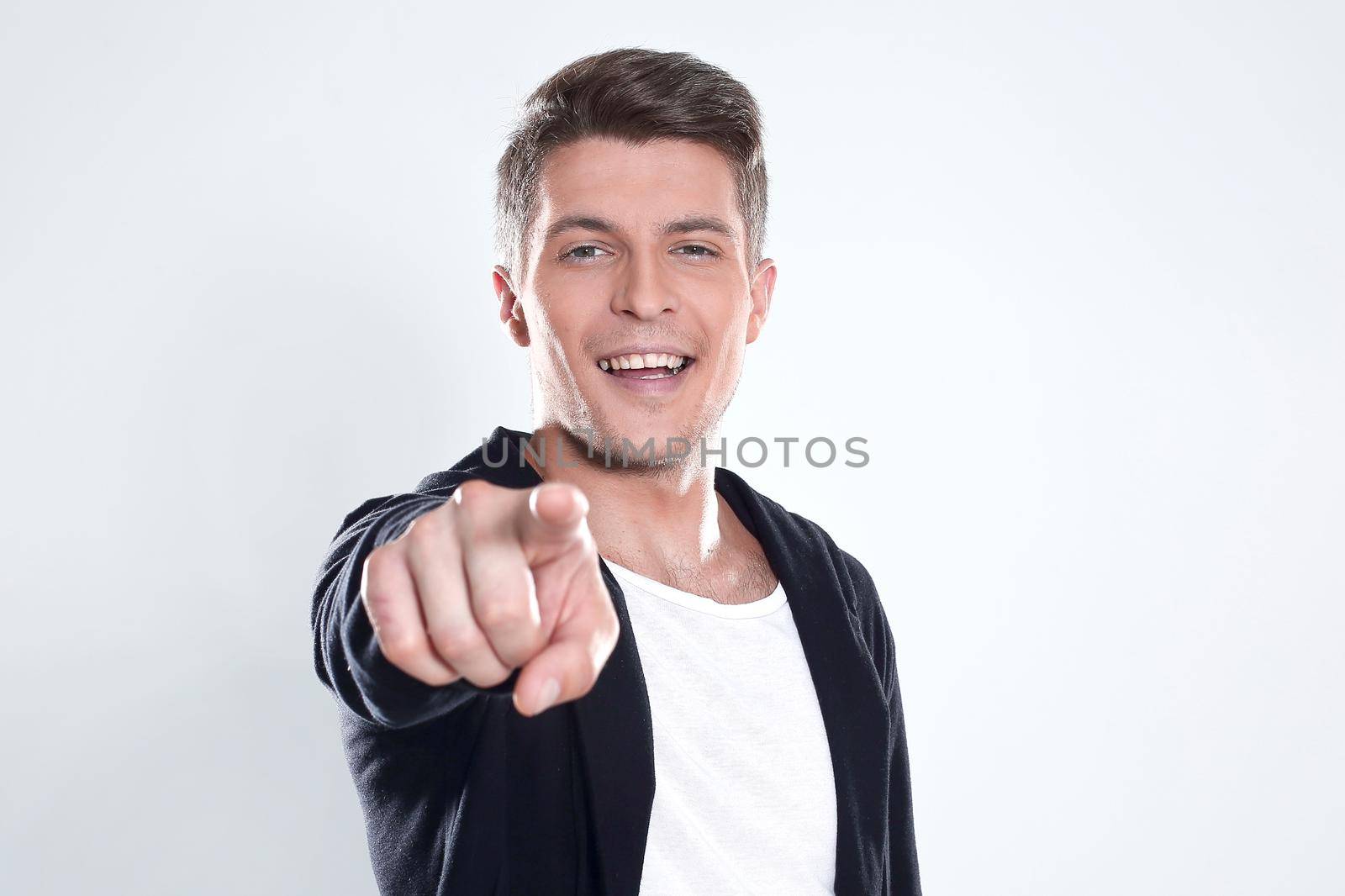 Happy smiling man with crossed arms pose, with blank copyspace area for text or slogan, against grey background