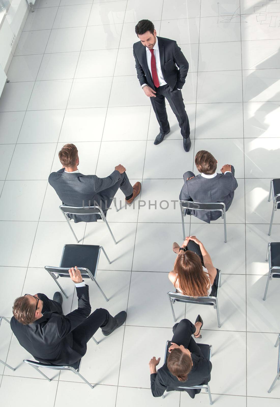 top view of the company's shareholders at a meeting