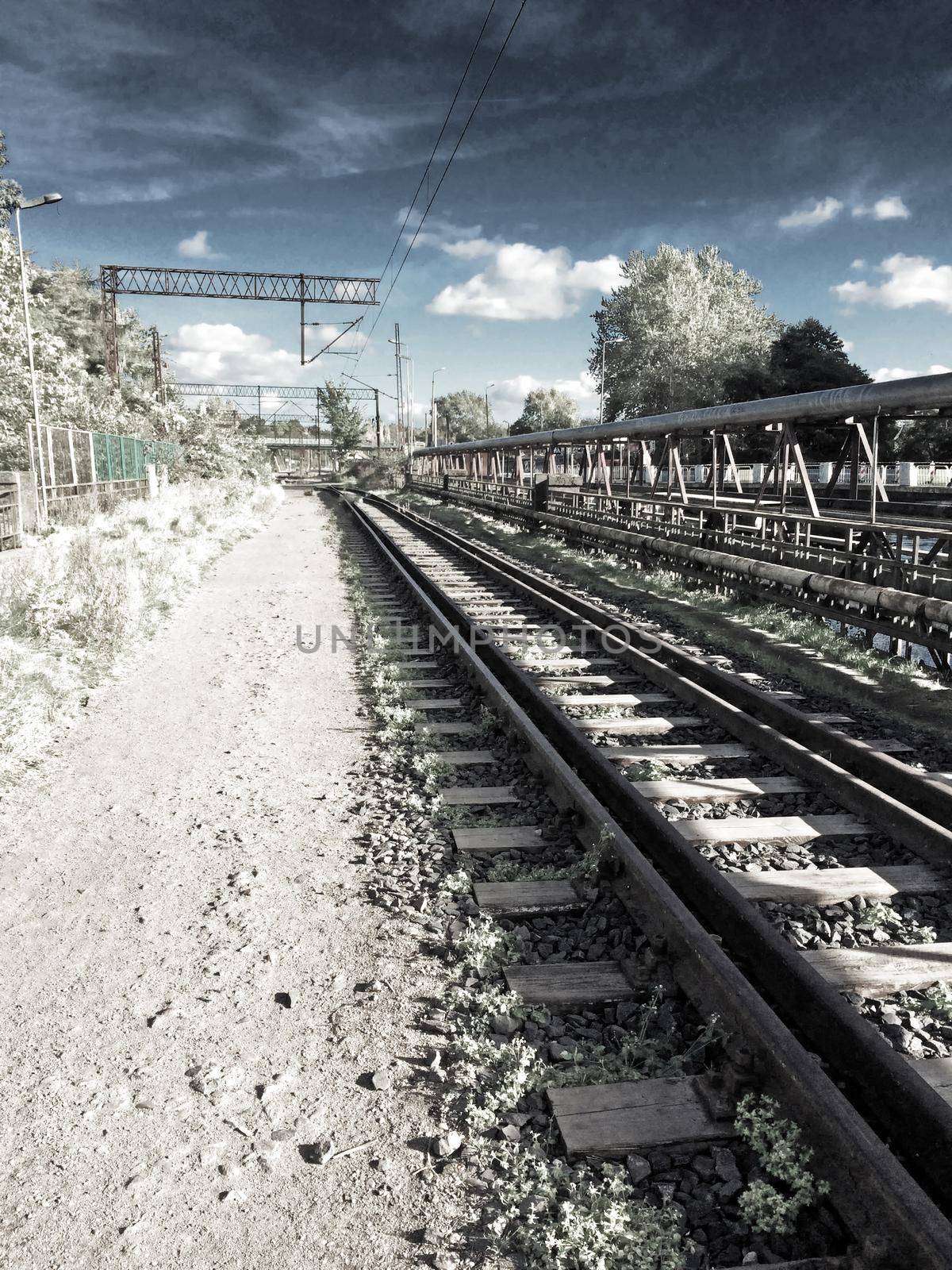 rails out of order in an infrared photo by Jochen