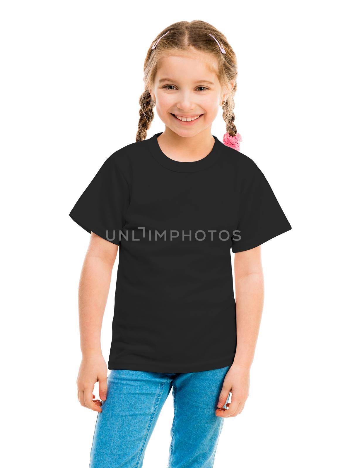 cute little girl in a black T-shirt and blue jeans on a white background