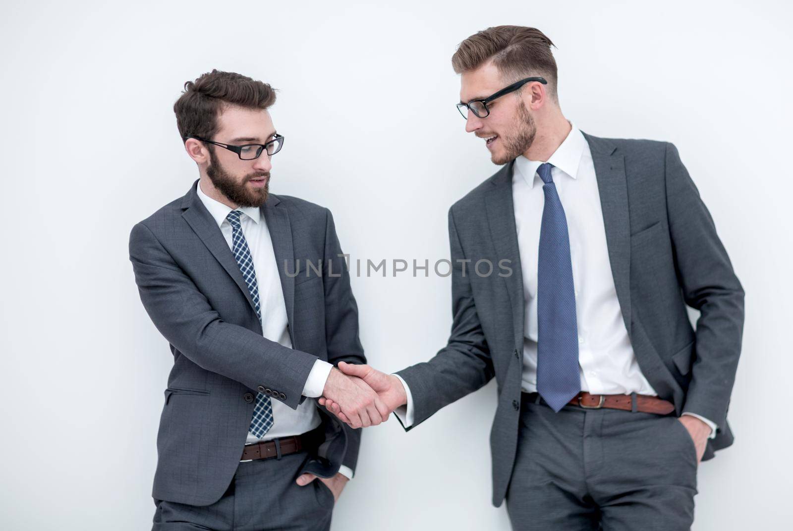 handshake of two business people.isolated on light background