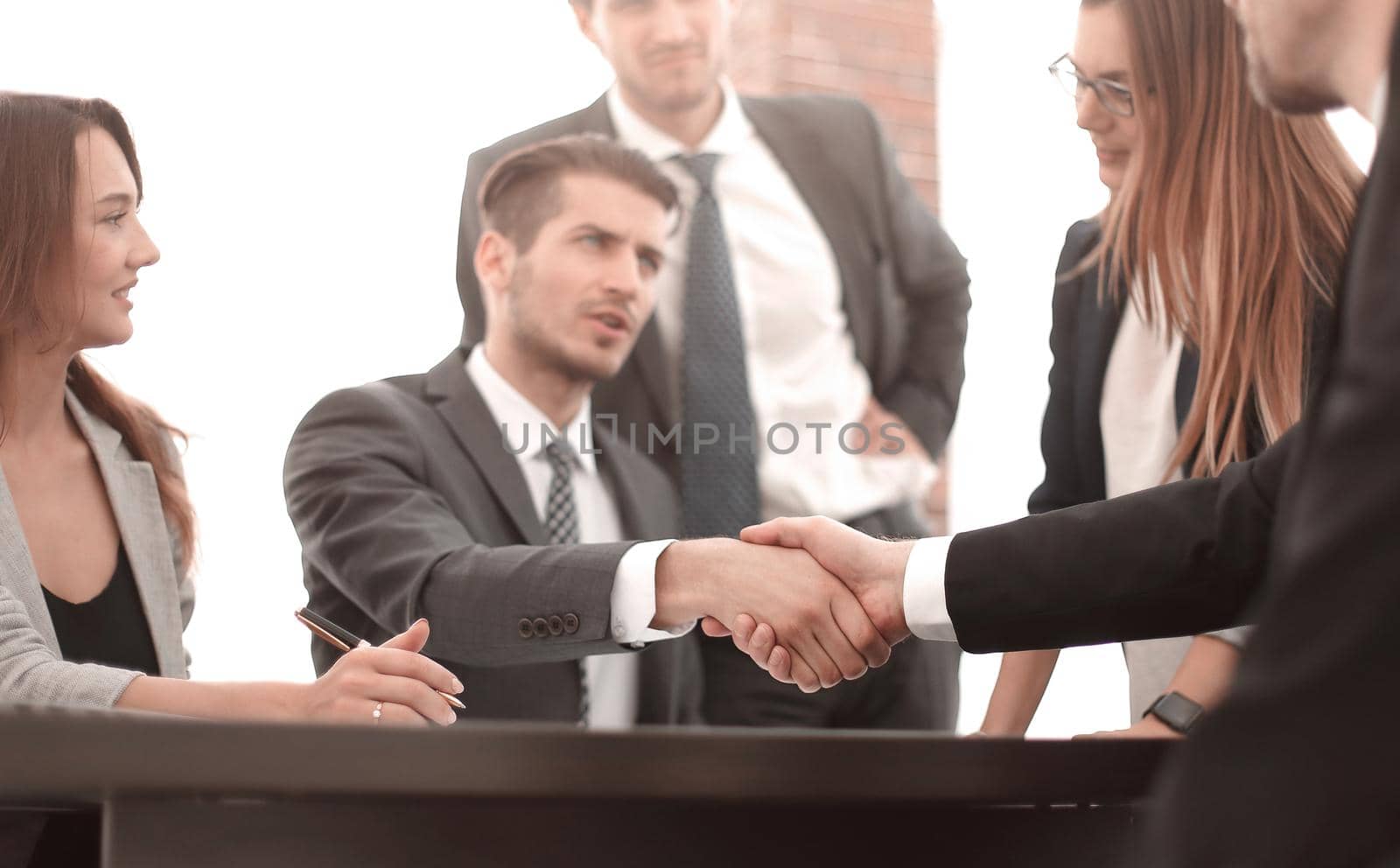 Business colleagues sitting at a table during a meeting