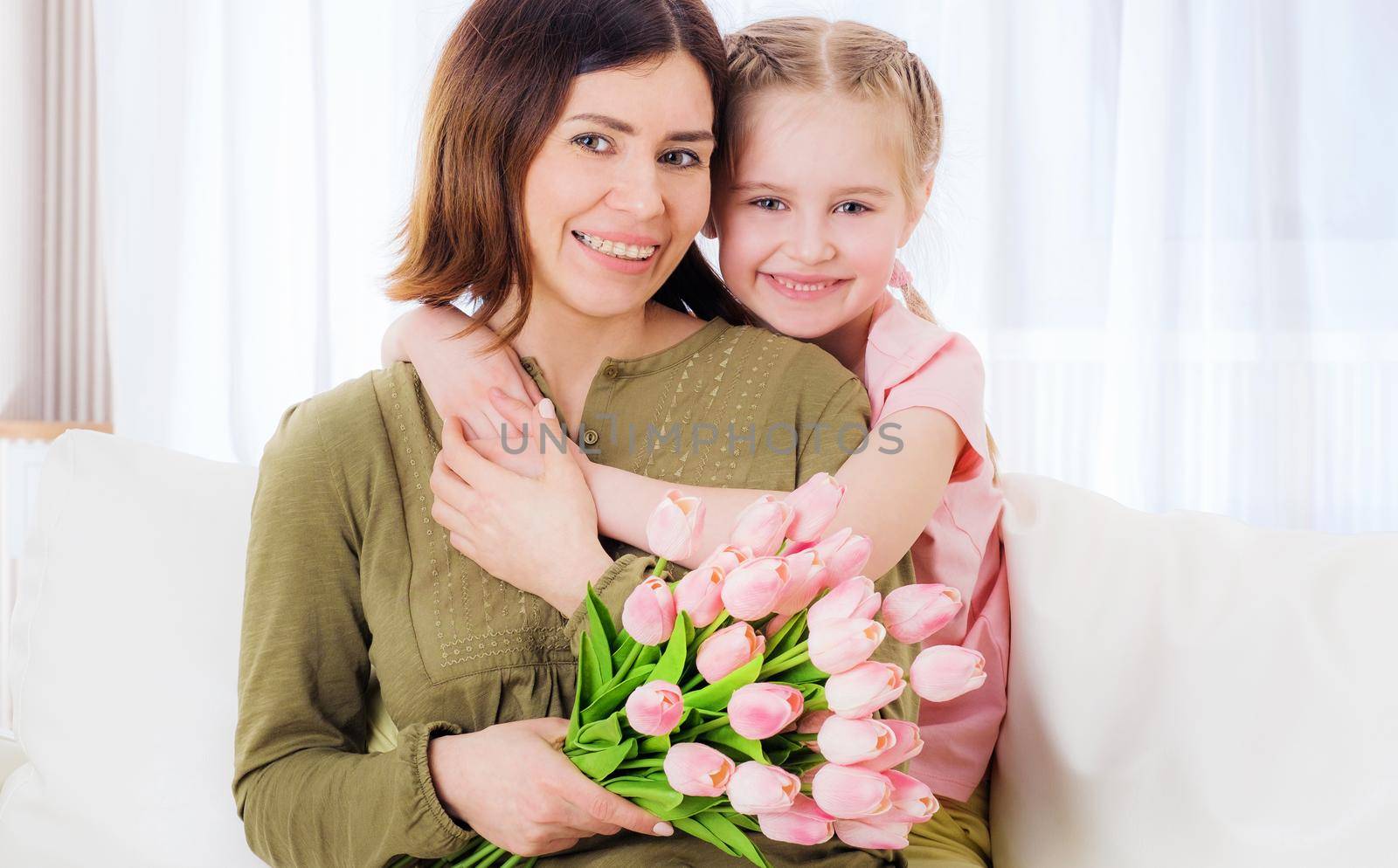 Little girl embracing mother by GekaSkr