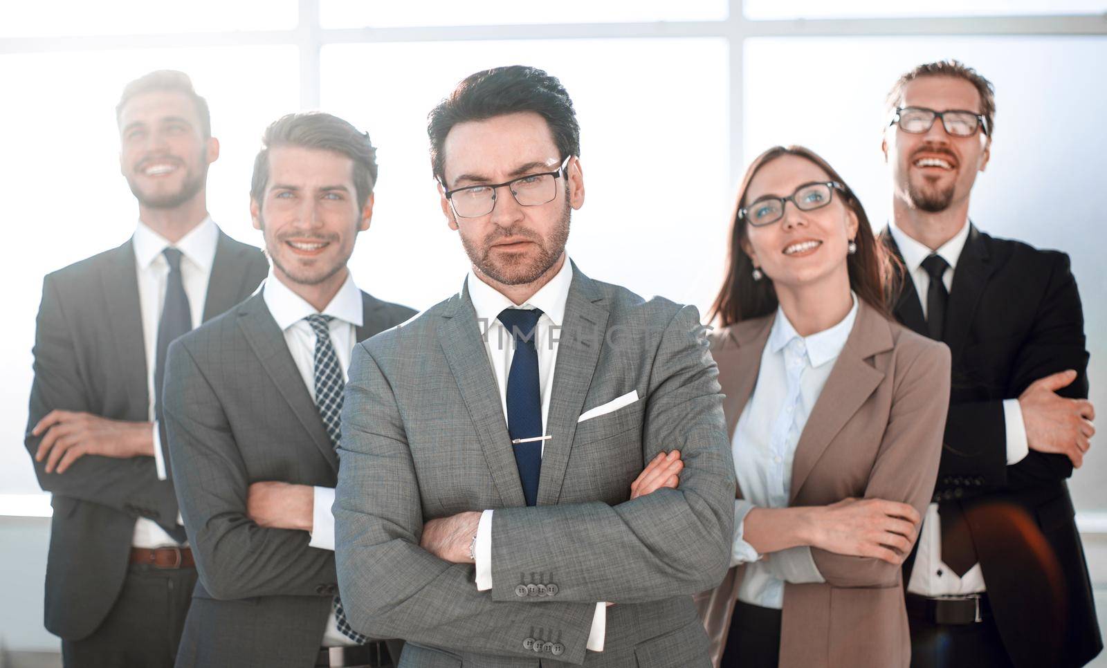 Confident business team standing in the office
