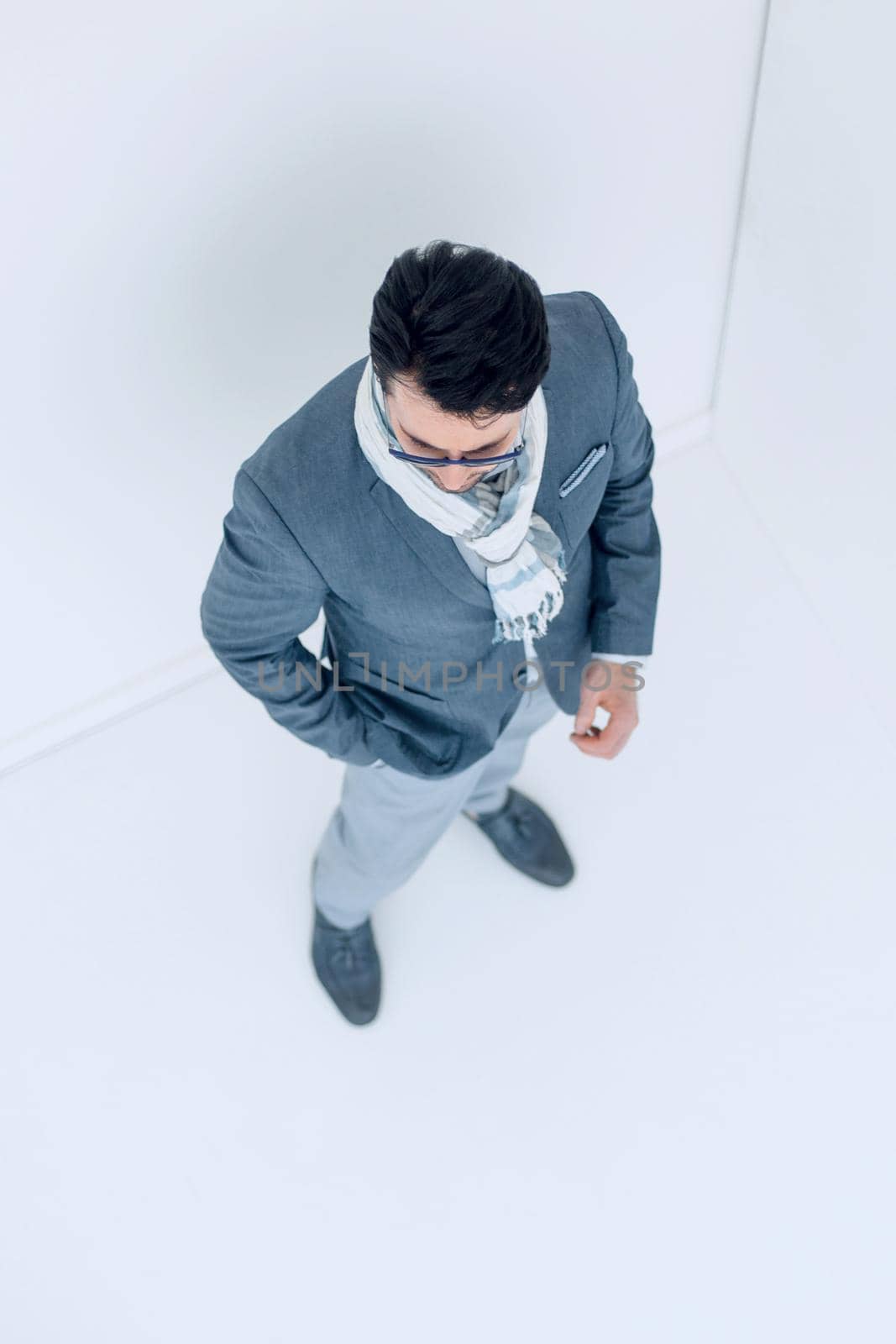 in full growth.stylish business man isolated on light