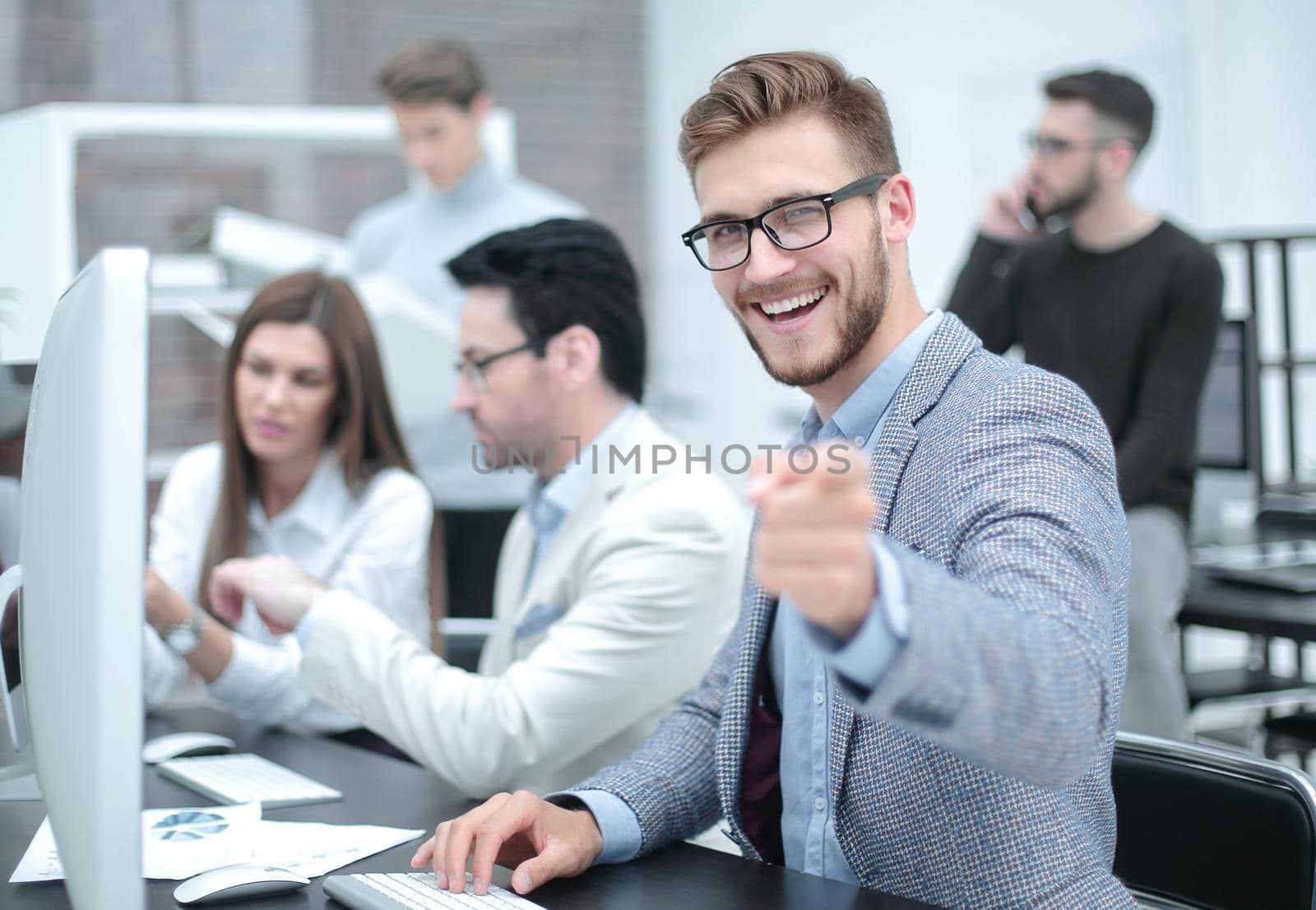 smiling businessman pointing at you by asdf