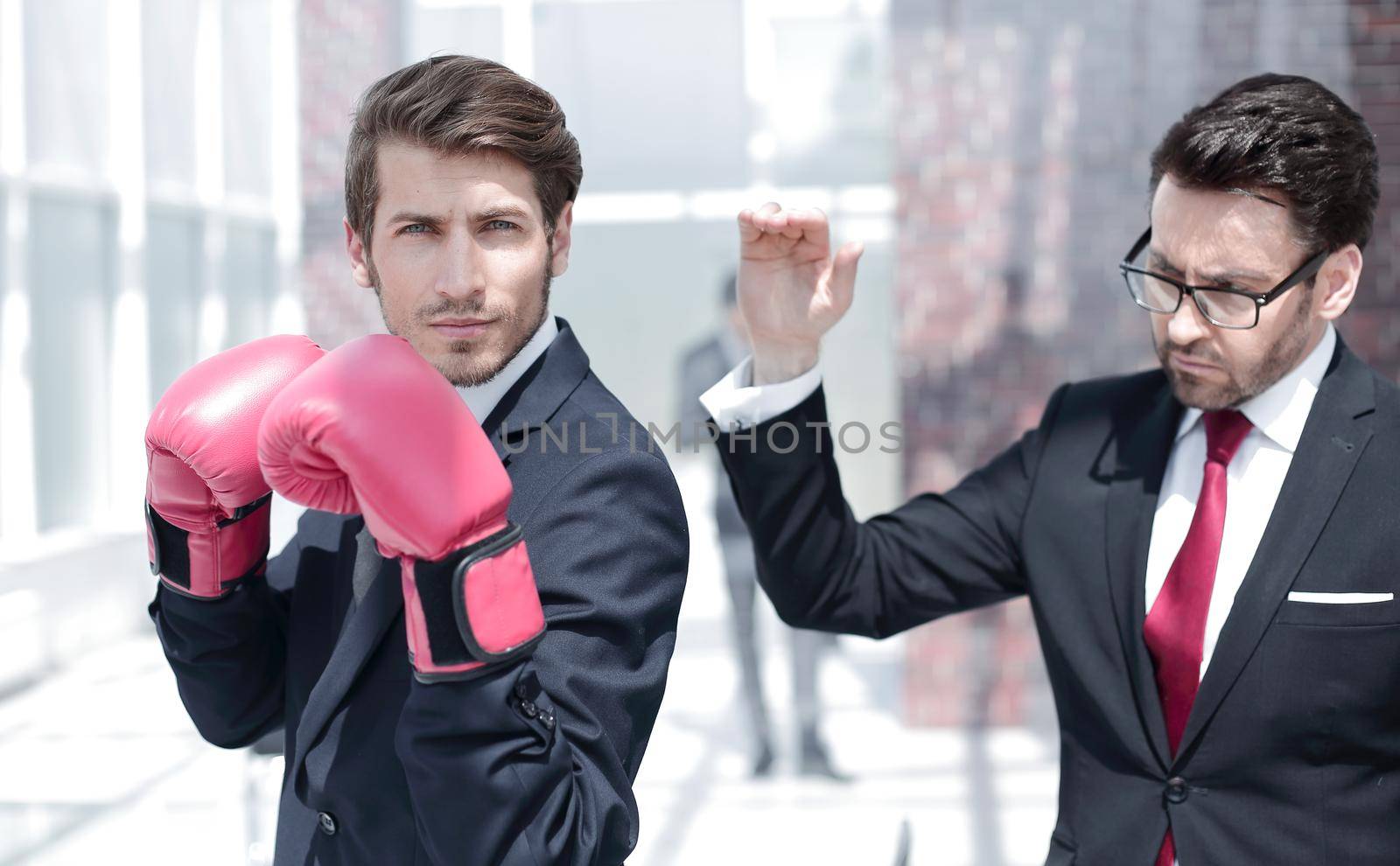 lawyer in Boxing gloves and his supervisor. the concept of business competition