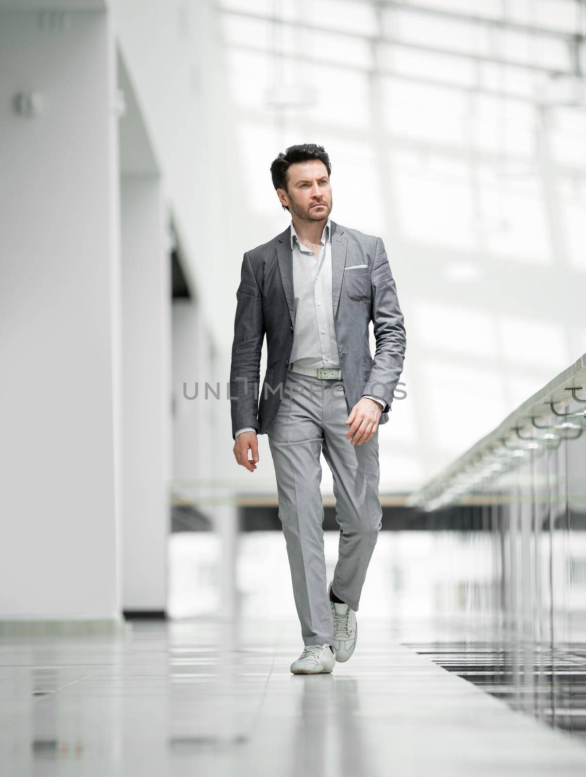 business man walking in the business center. business concept