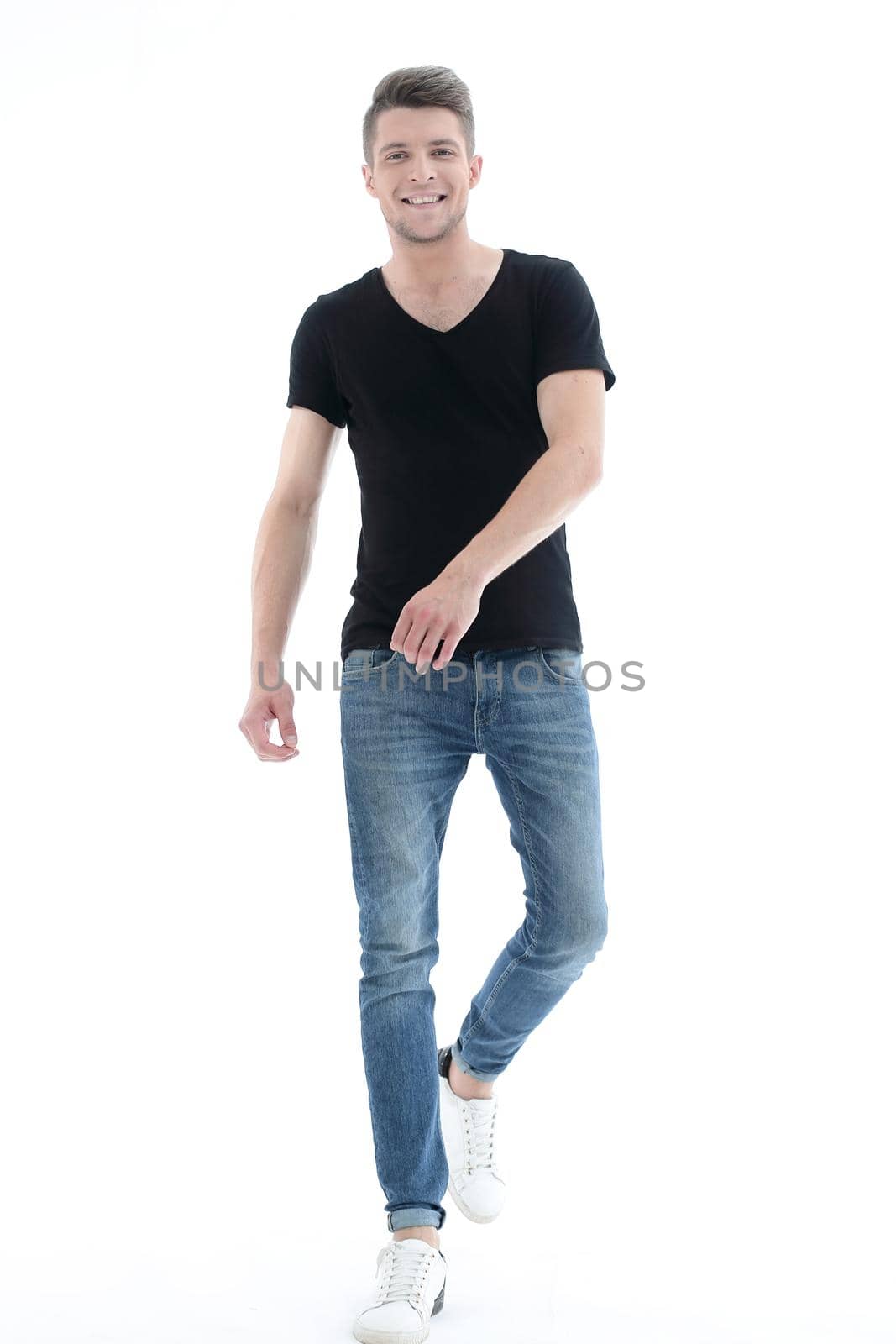 Stylish young man posing on a white background