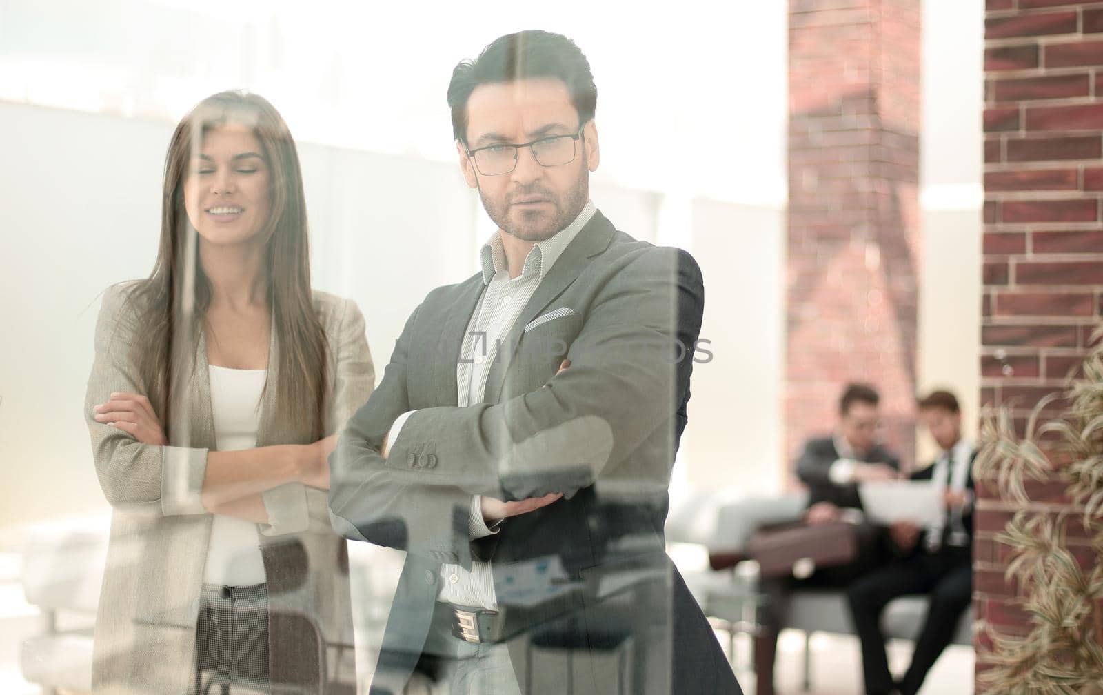 business partners standing in a modern office.business concept