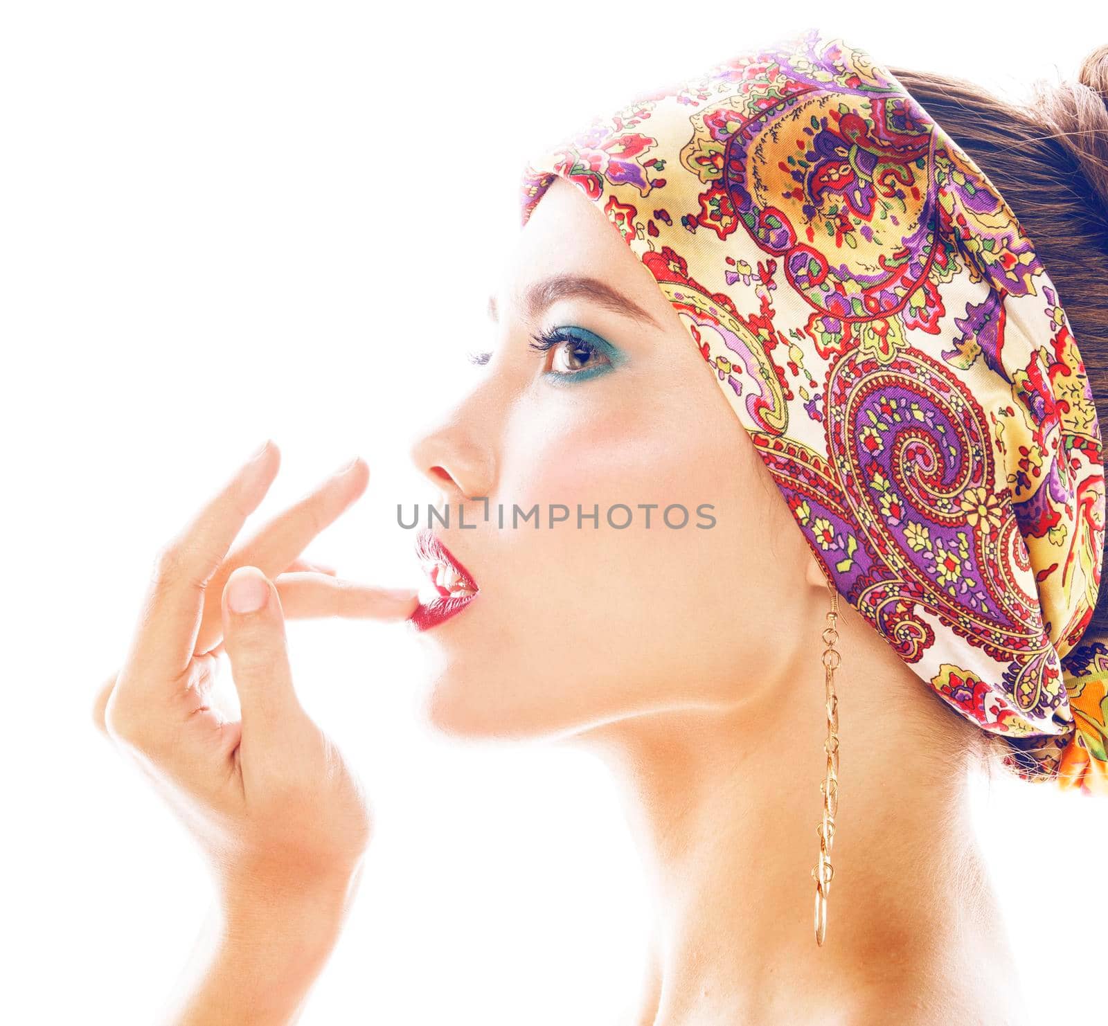 young pretty modern girl with bright shawl on head emotional posing isolated on white background fashion makeup