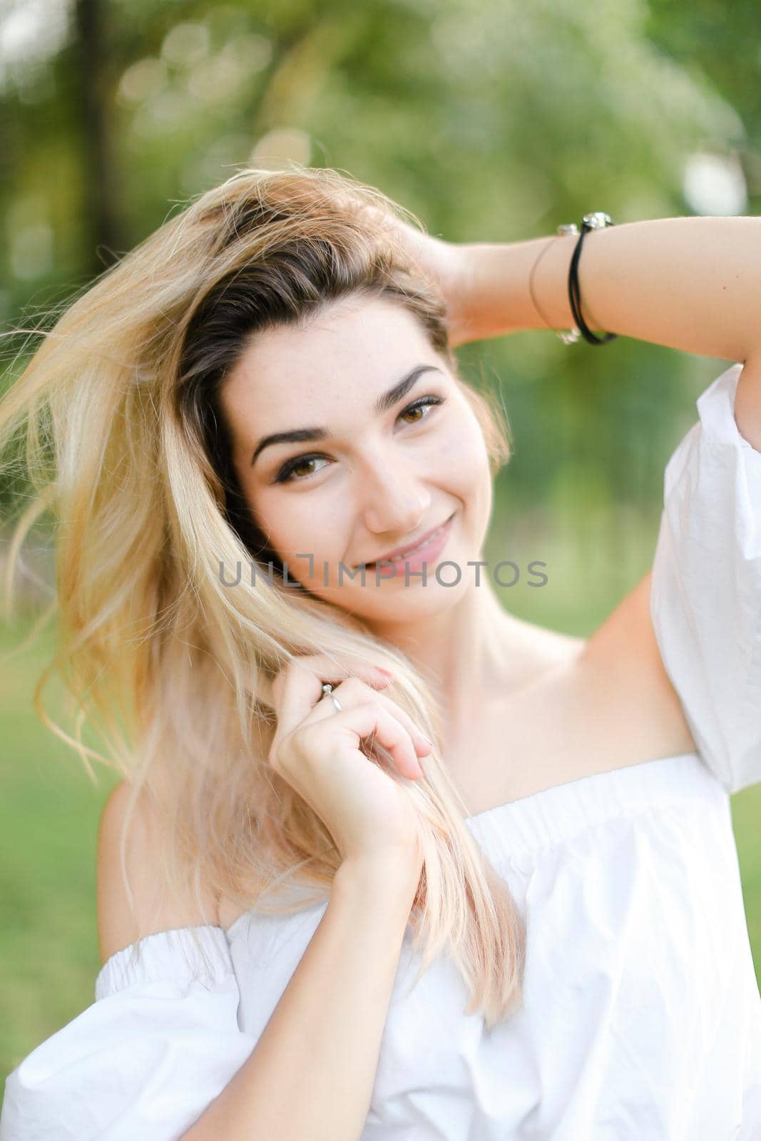 Portrait of young charming woman, green background. by sisterspro