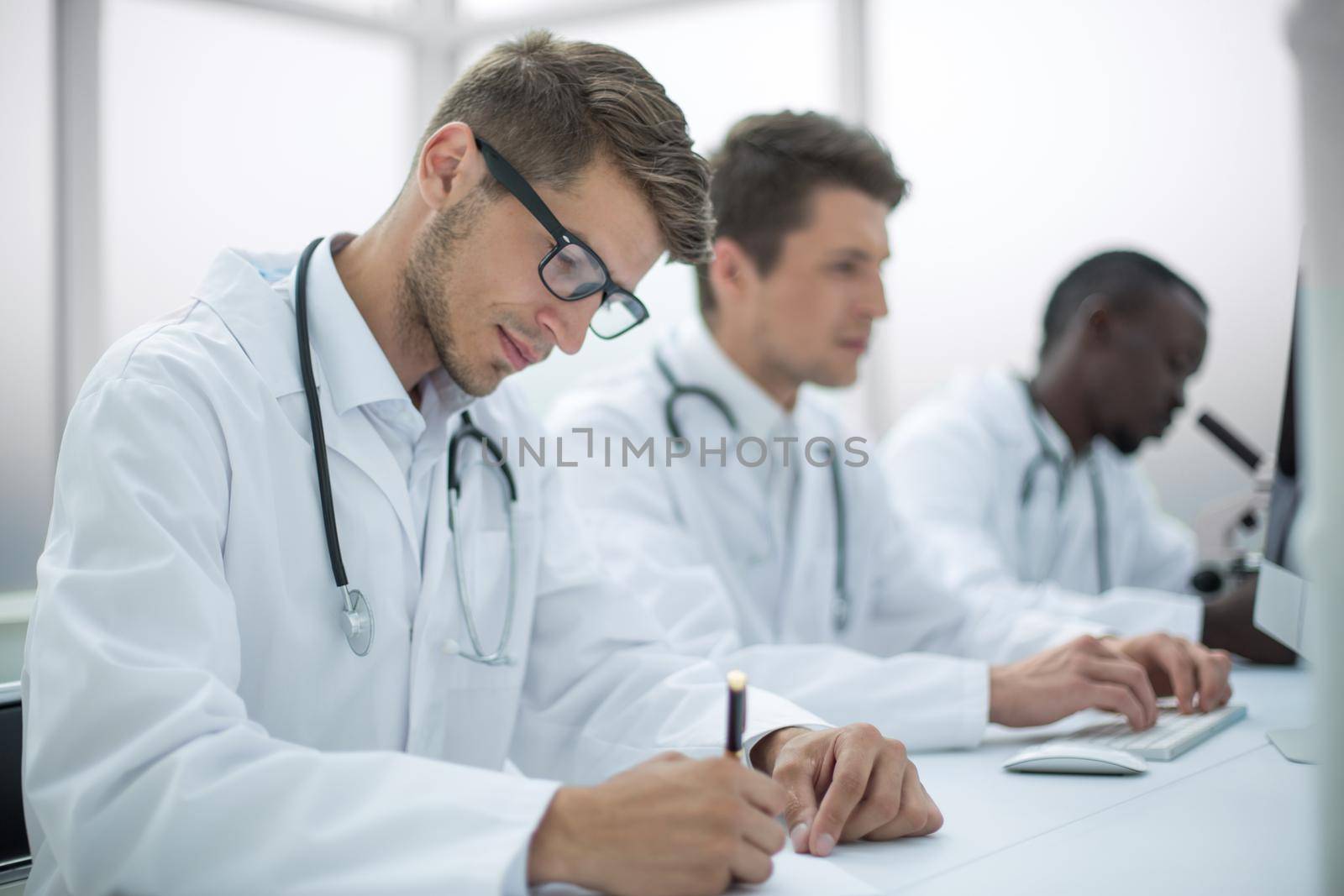 group of doctors conducting laboratory studies.the concept of health