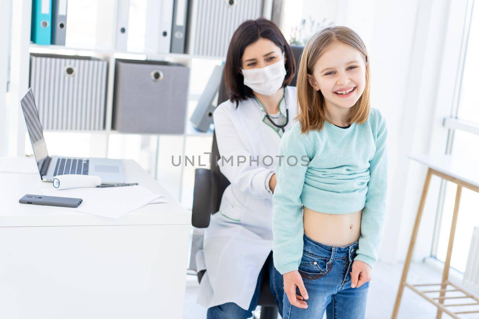 Girl during appointment with doctor by GekaSkr