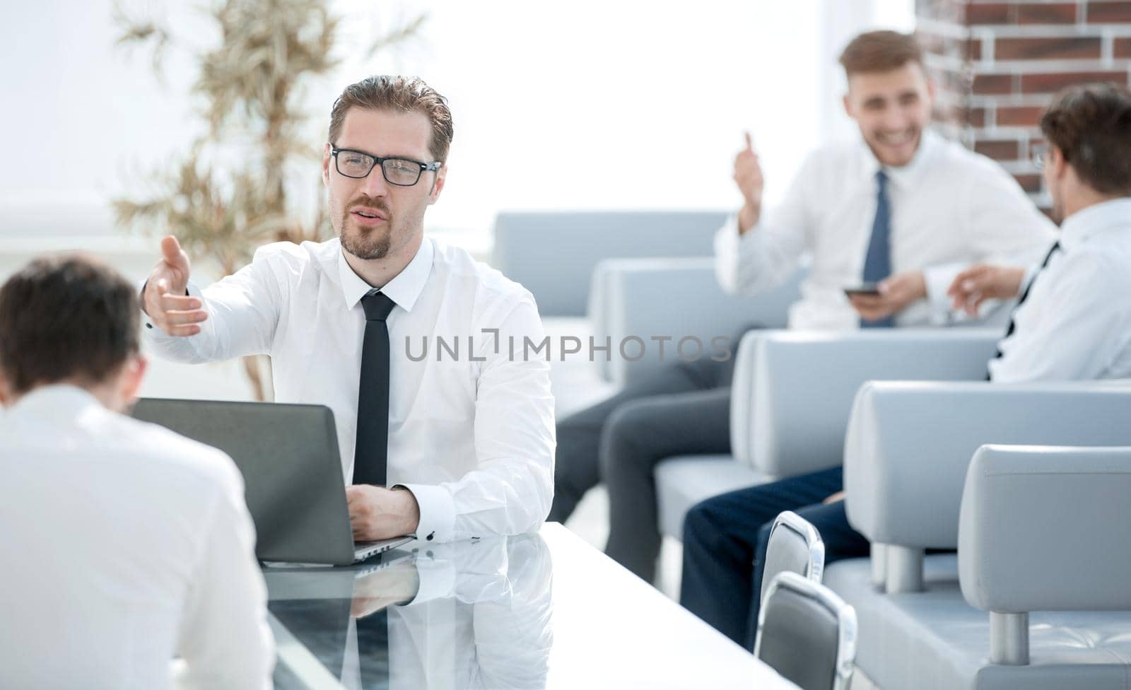 employees discussing new ideas in a modern office.office weekdays