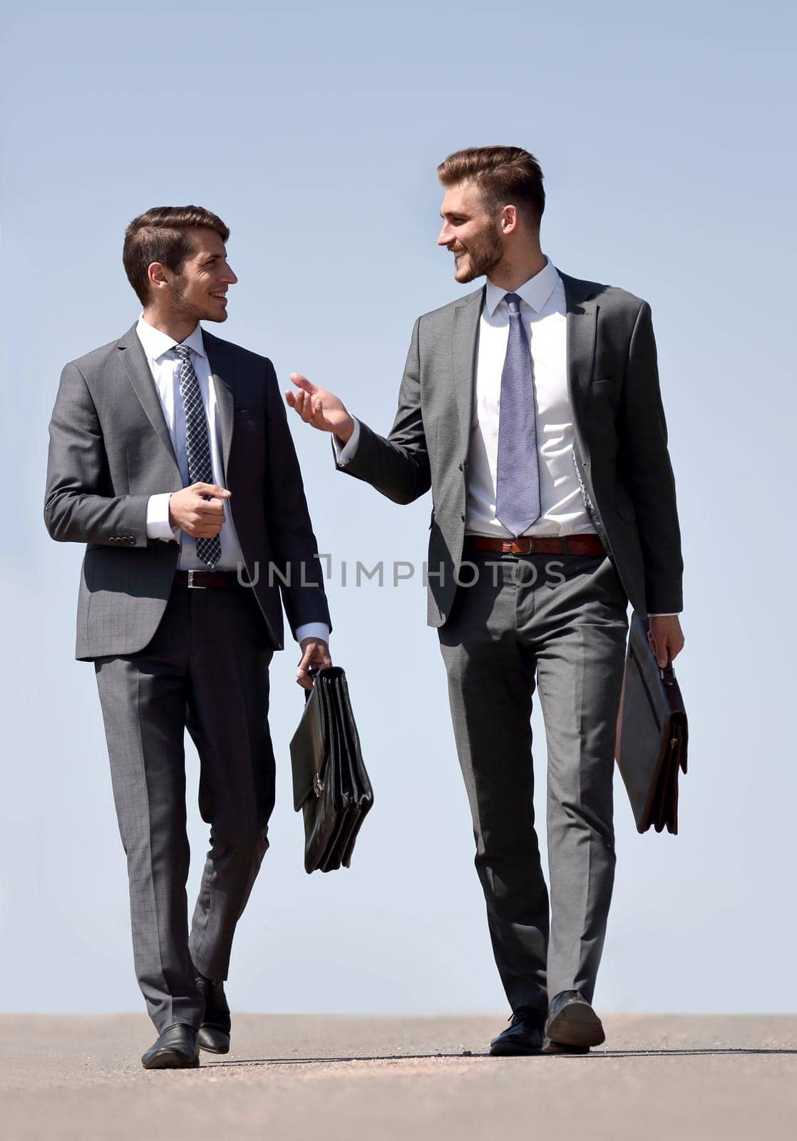 business people discuss something on the street .photo with copy space