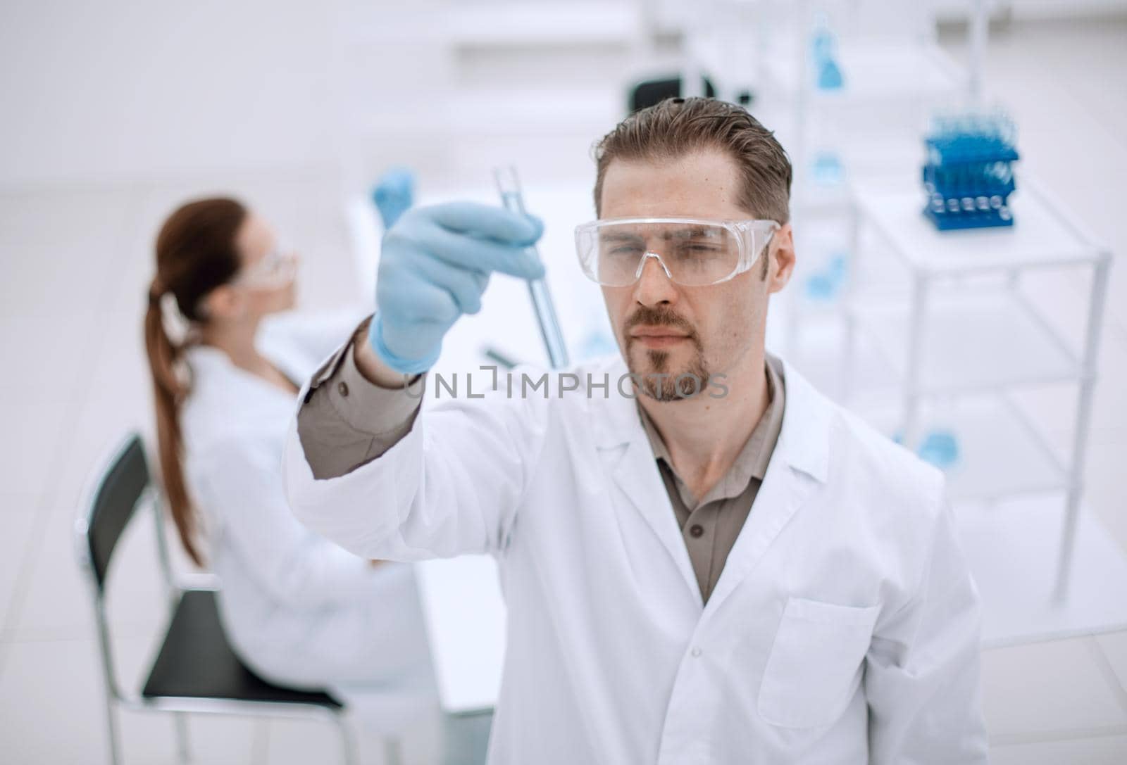 serious scientist looks at the test results.photo with copy space