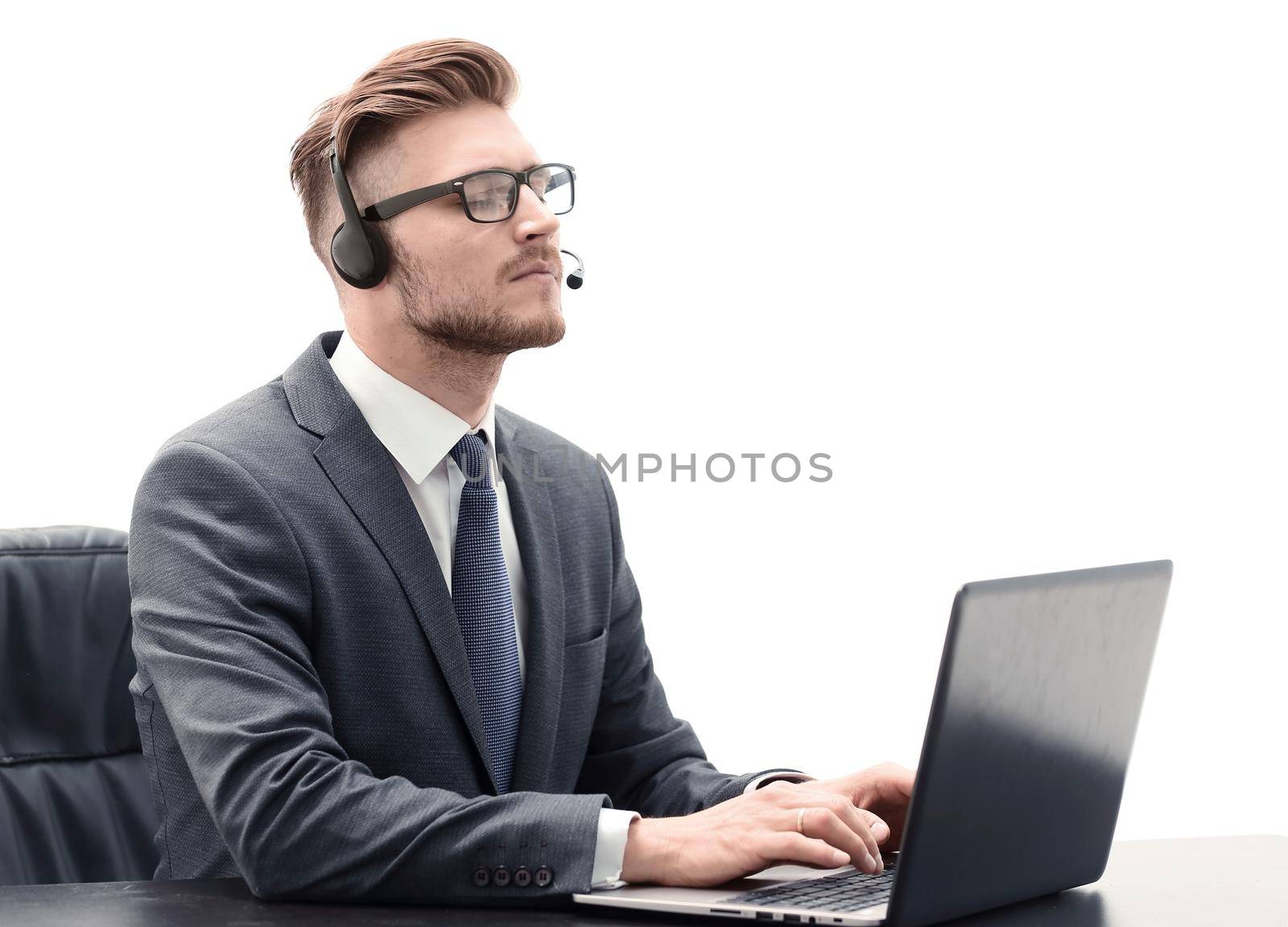 attentive businessman listening to audio business course . the concept of e-learning