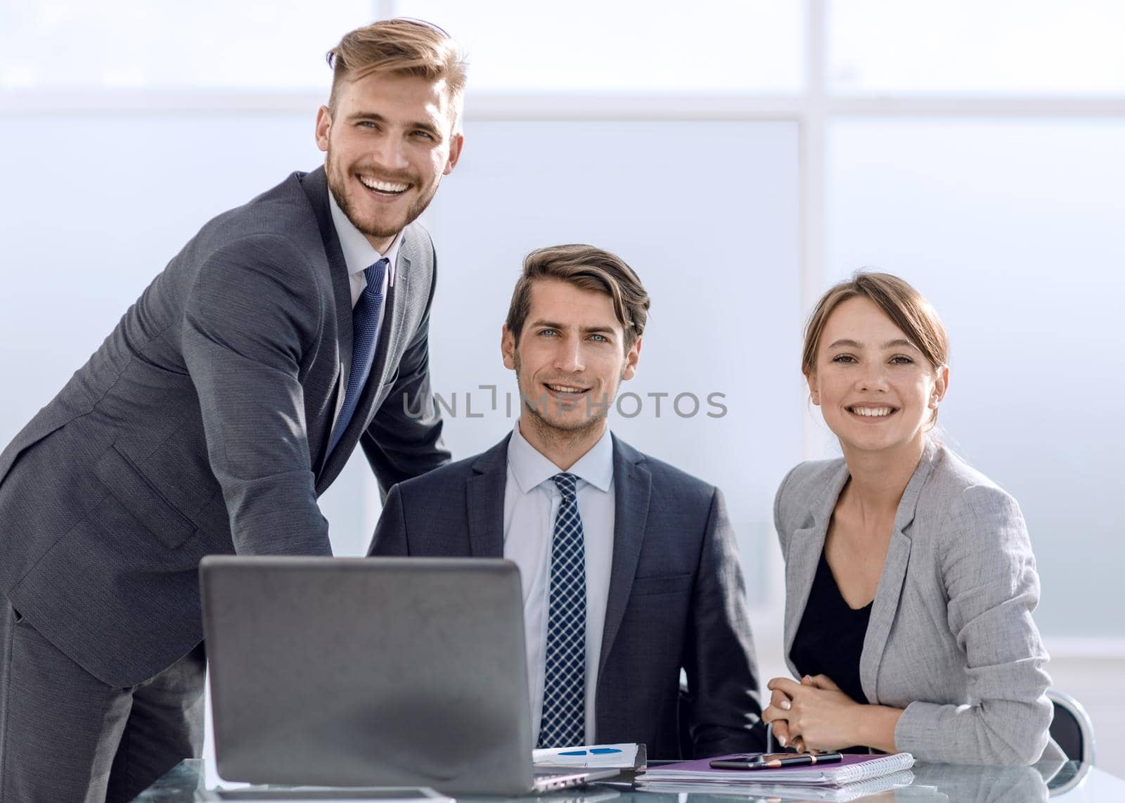 business team sitting at the Desk.photo with copy space