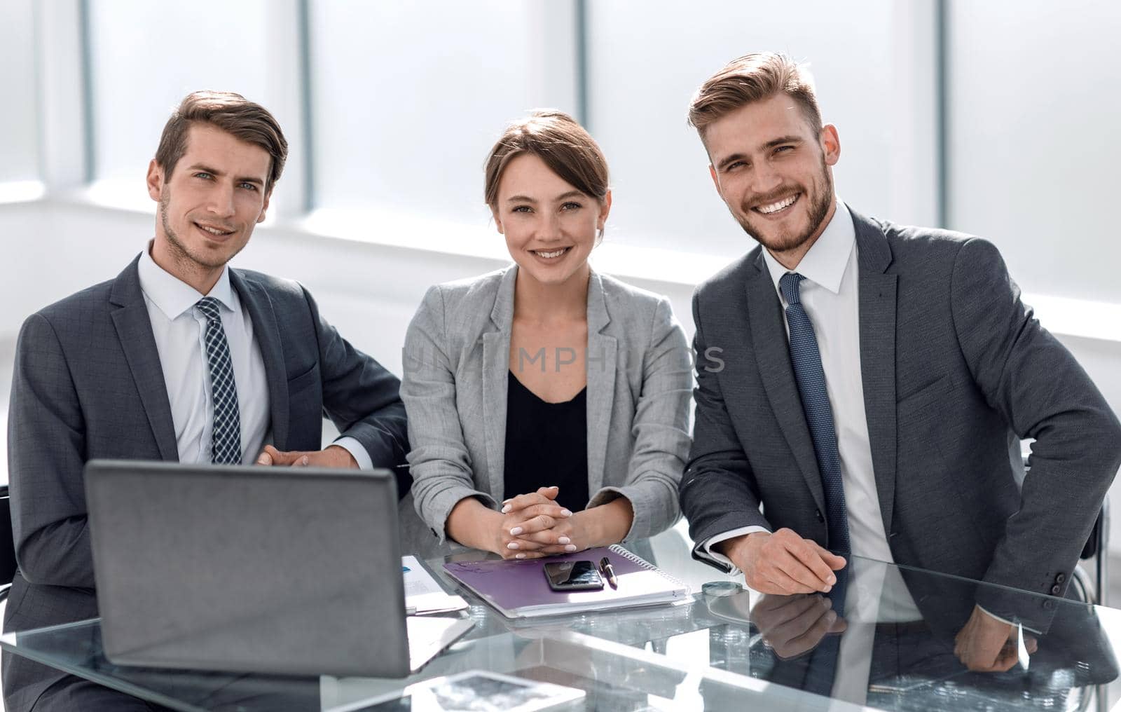 professional business team sitting at the Desk.photo with copy space