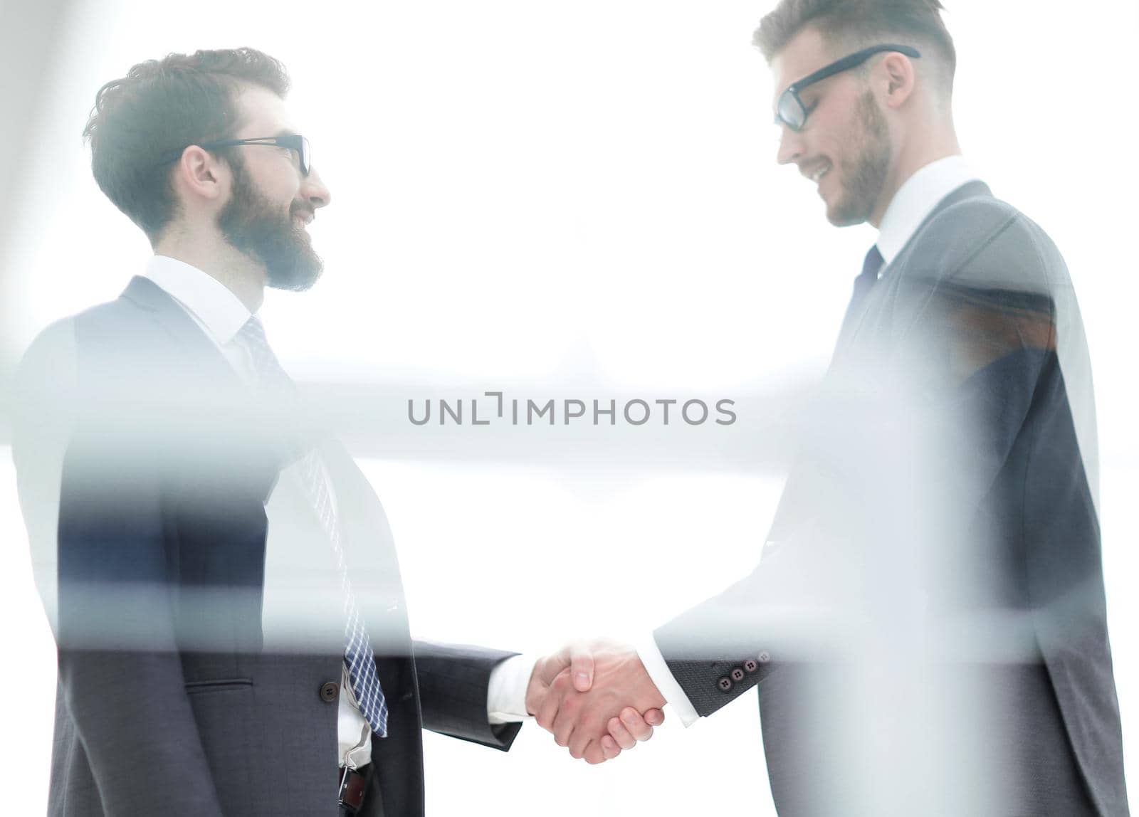 handshake is serious business partners.the concept of cooperation
