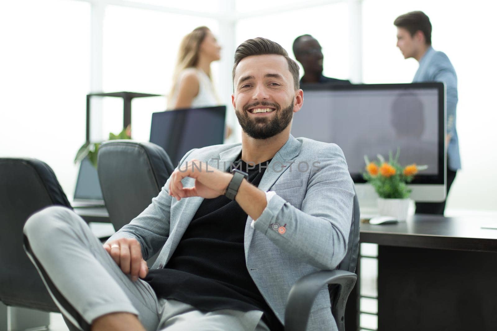 successful businessman in a creative office.photo with copy space