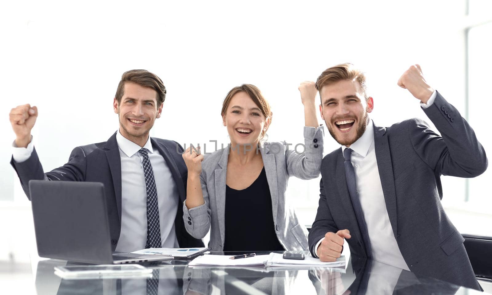 successful business team sitting at the Desk.photo with copy space