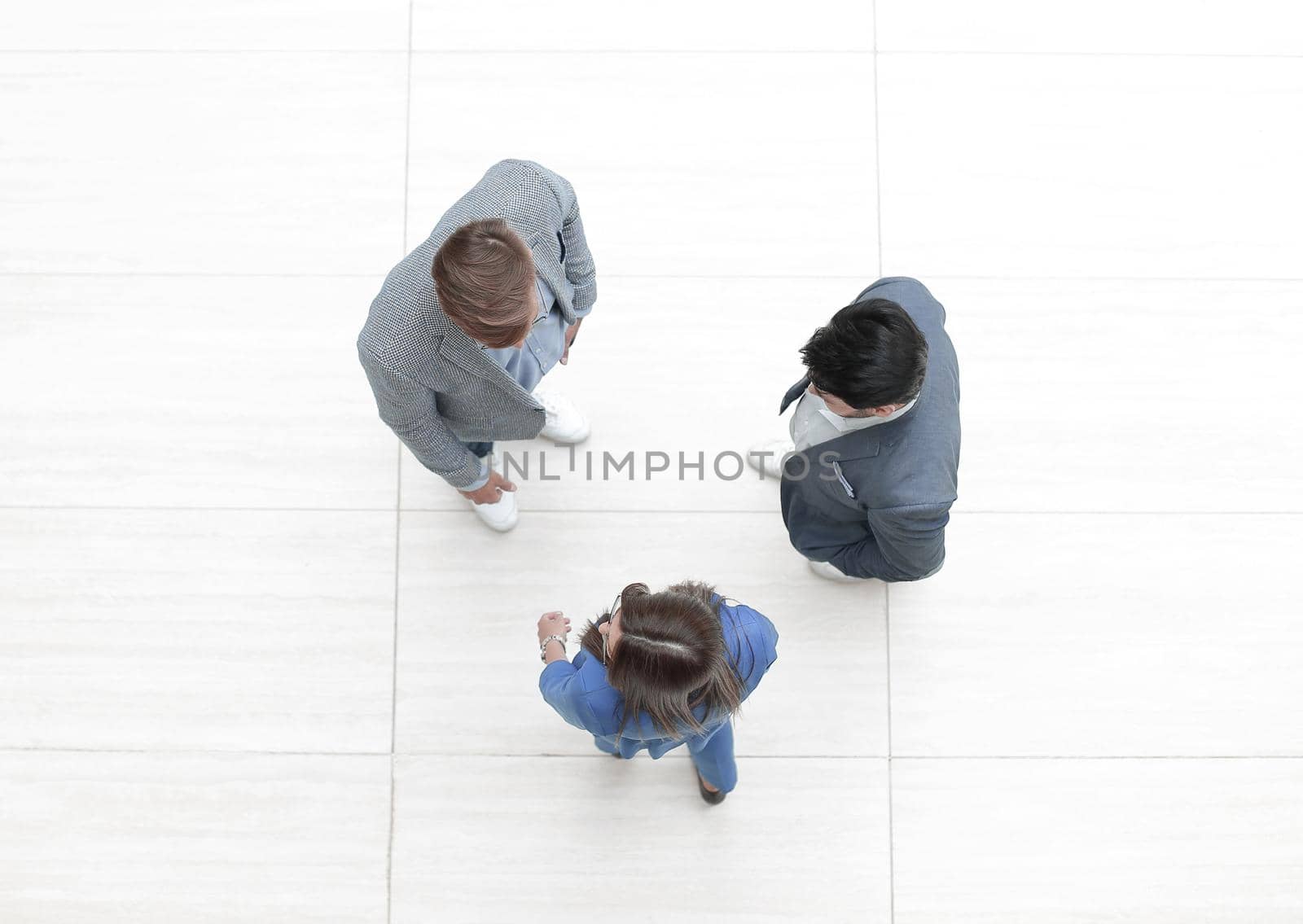 top view.business team discussing important issues. photo with copy space